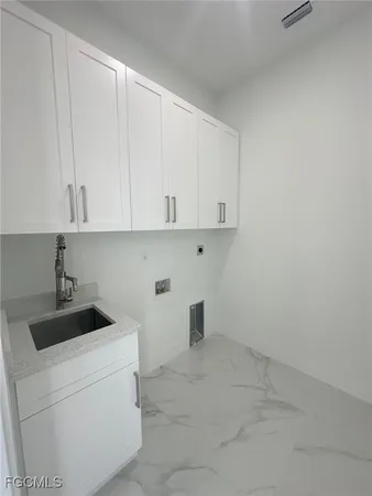 a view of cabinets and sink