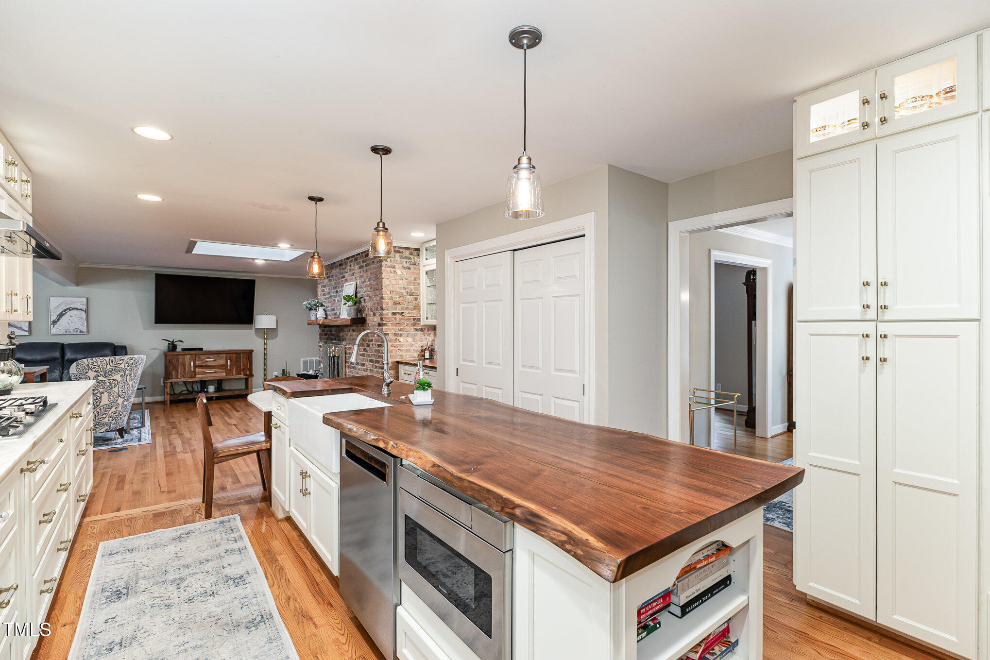 816 Thatcher Way Raleigh, NC 27615 - Photo 12 of 53 a kitchen that has a stove a sink and a refrigerator