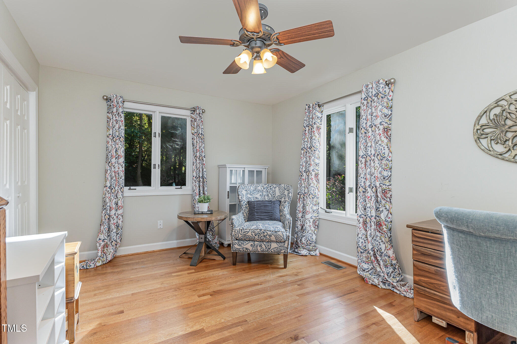 816 Thatcher Way Raleigh, NC 27615 - Photo 21 of 53 a living room with furniture and a large window