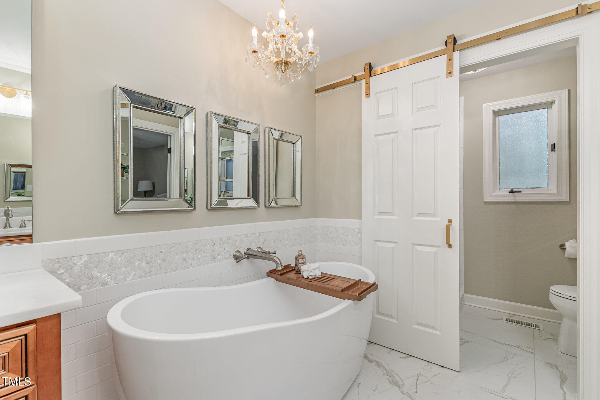 816 Thatcher Way Raleigh, NC 27615 - Photo 26 of 53 a white bath tub sitting next to a white toilet