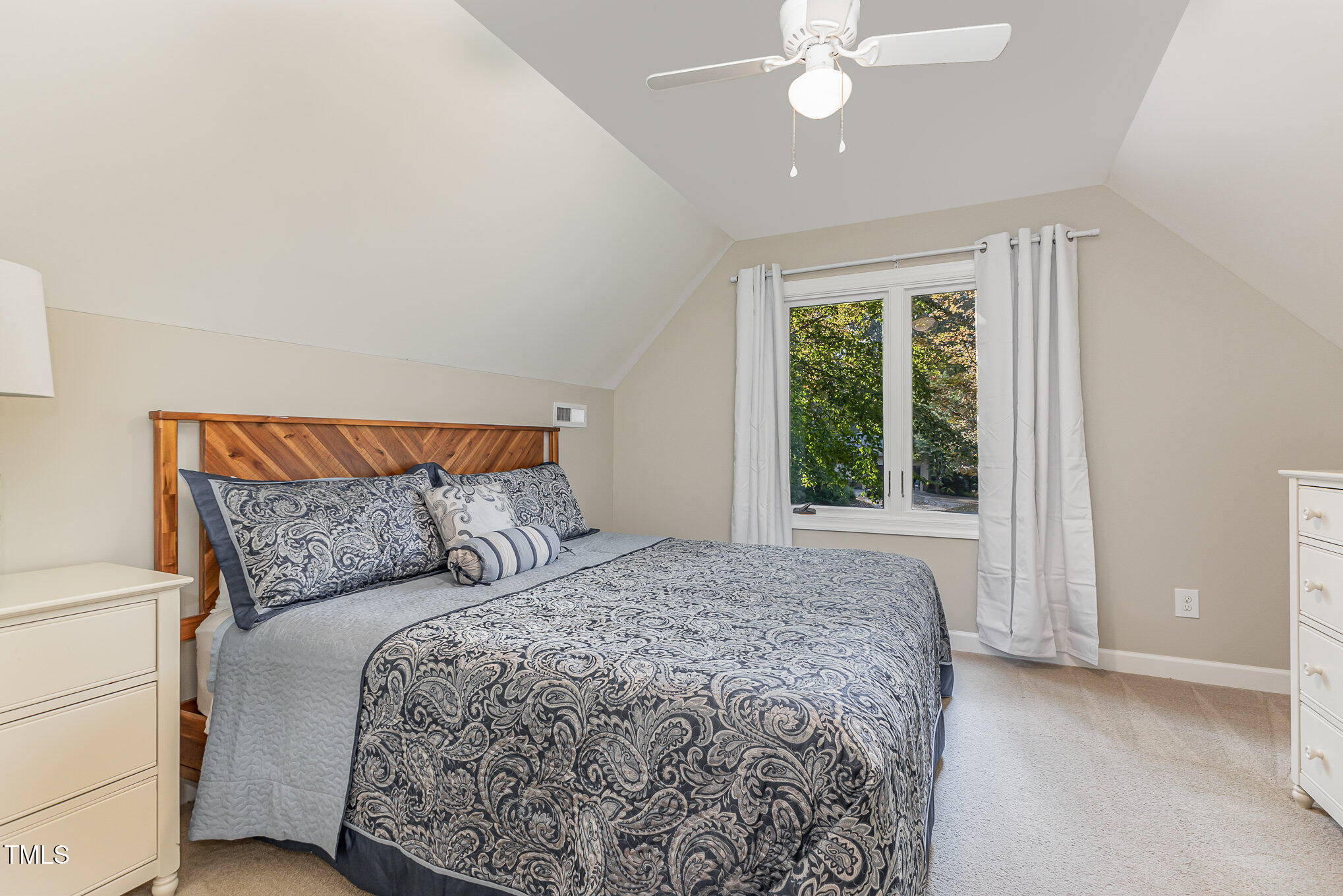 816 Thatcher Way Raleigh, NC 27615 - Photo 28 of 53 a bedroom with a large bed and a window