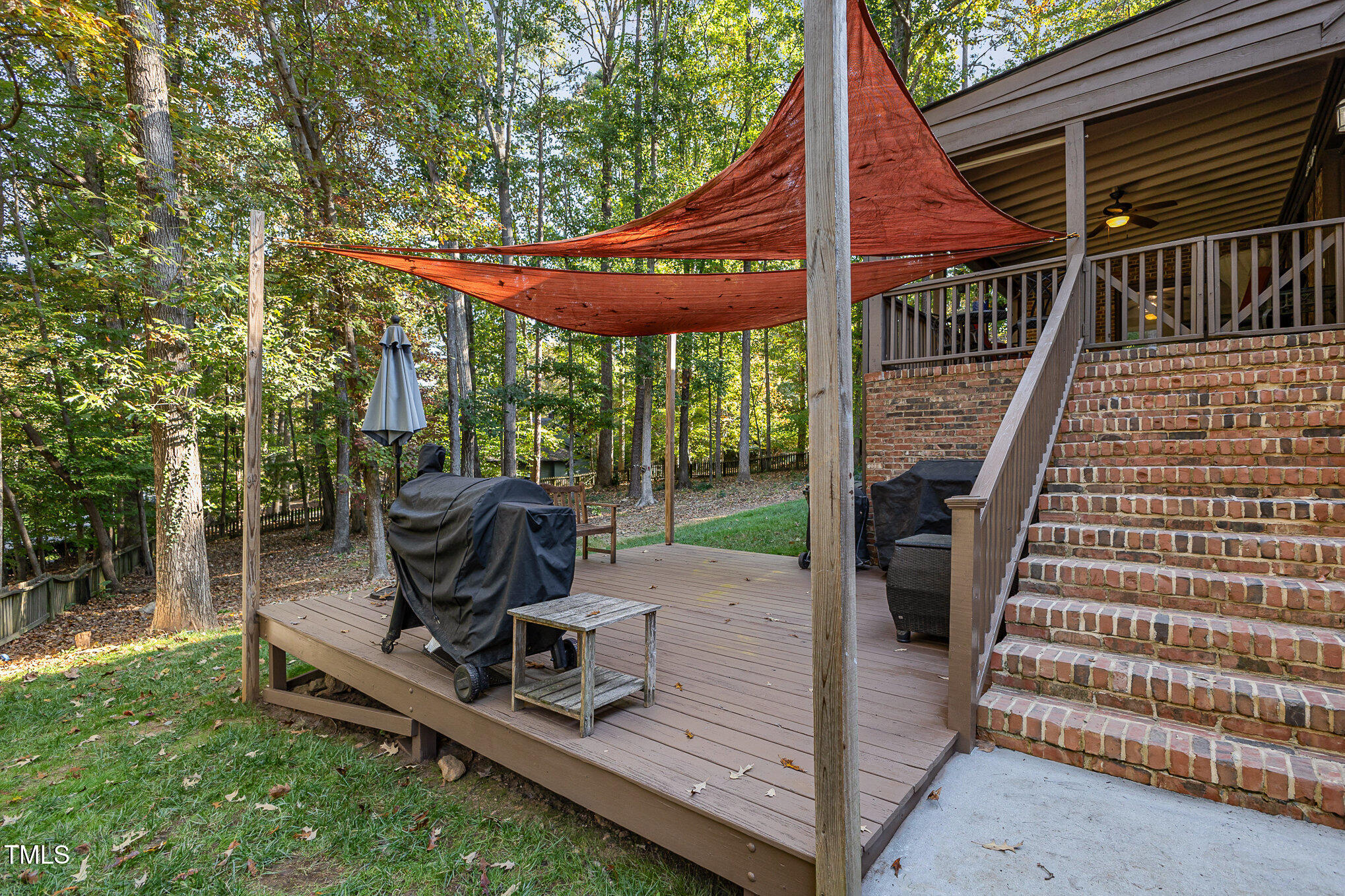 816 Thatcher Way Raleigh, NC 27615 - Photo 40 of 53 a view of backyard with deck and garden
