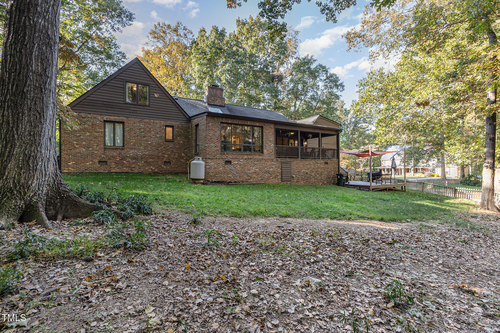 816 Thatcher Way Raleigh, NC 27615 - Photo 43 of 53 a front view of a house with a garden and trees