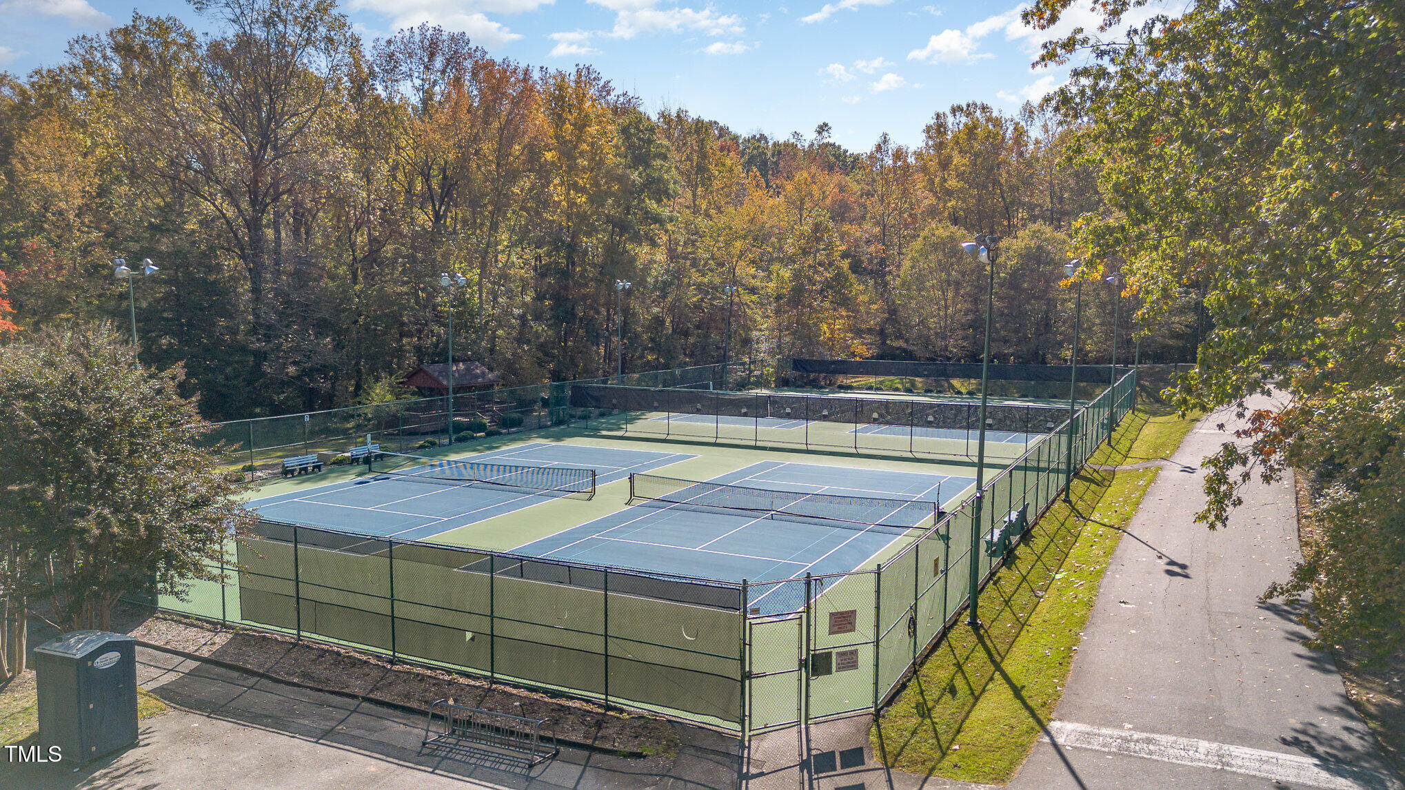816 Thatcher Way Raleigh, NC 27615 - Photo 50 of 53 a view of a tennis ground with large trees
