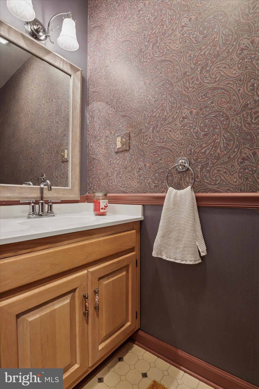 227 Parsons Road Landenberg, PA 19350 - Photo 16 of 40 a bathroom with a sink and a mirror