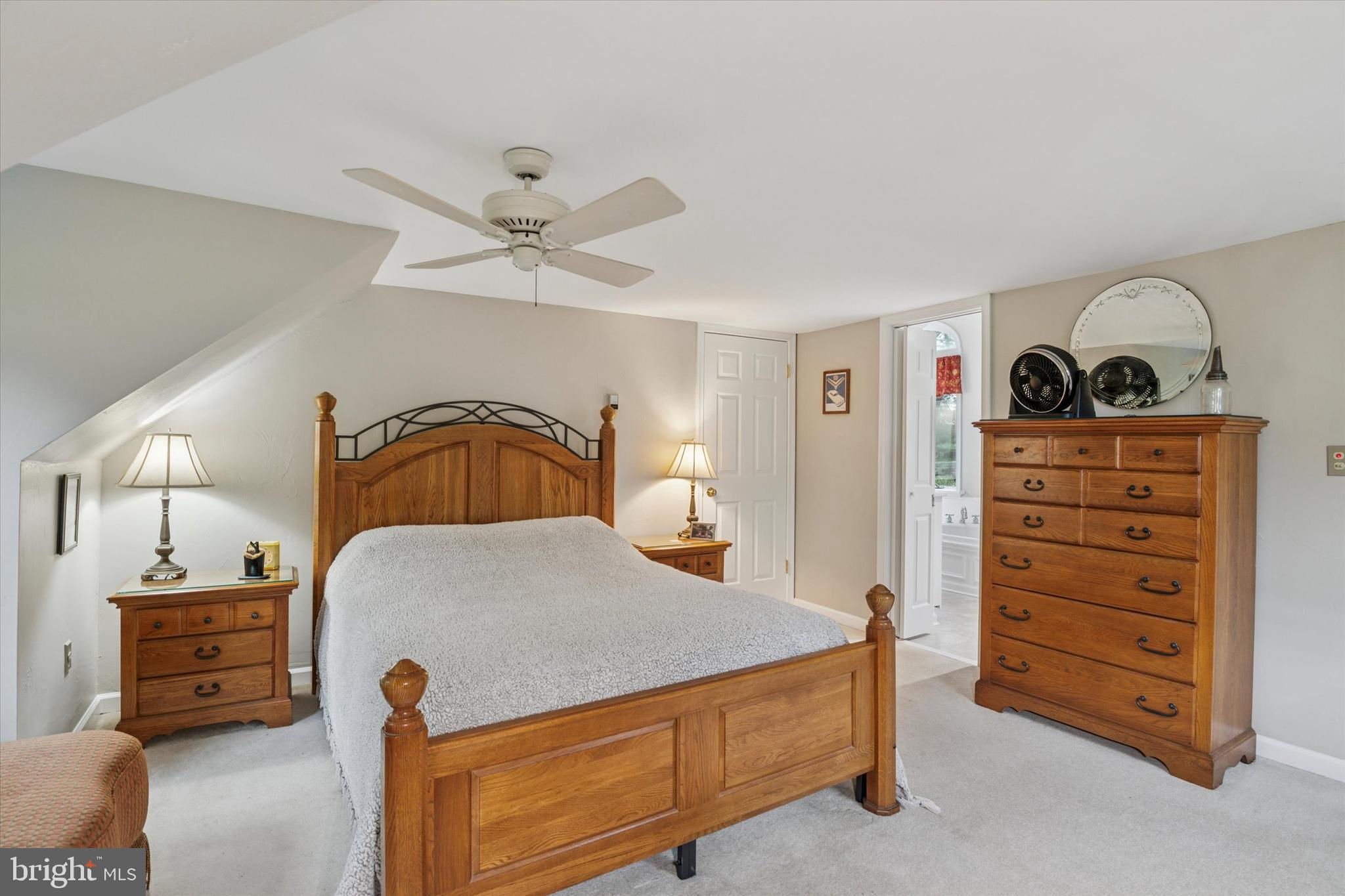 227 Parsons Road Landenberg, PA 19350 - Photo 17 of 40 a bedroom with a bed and a dresser