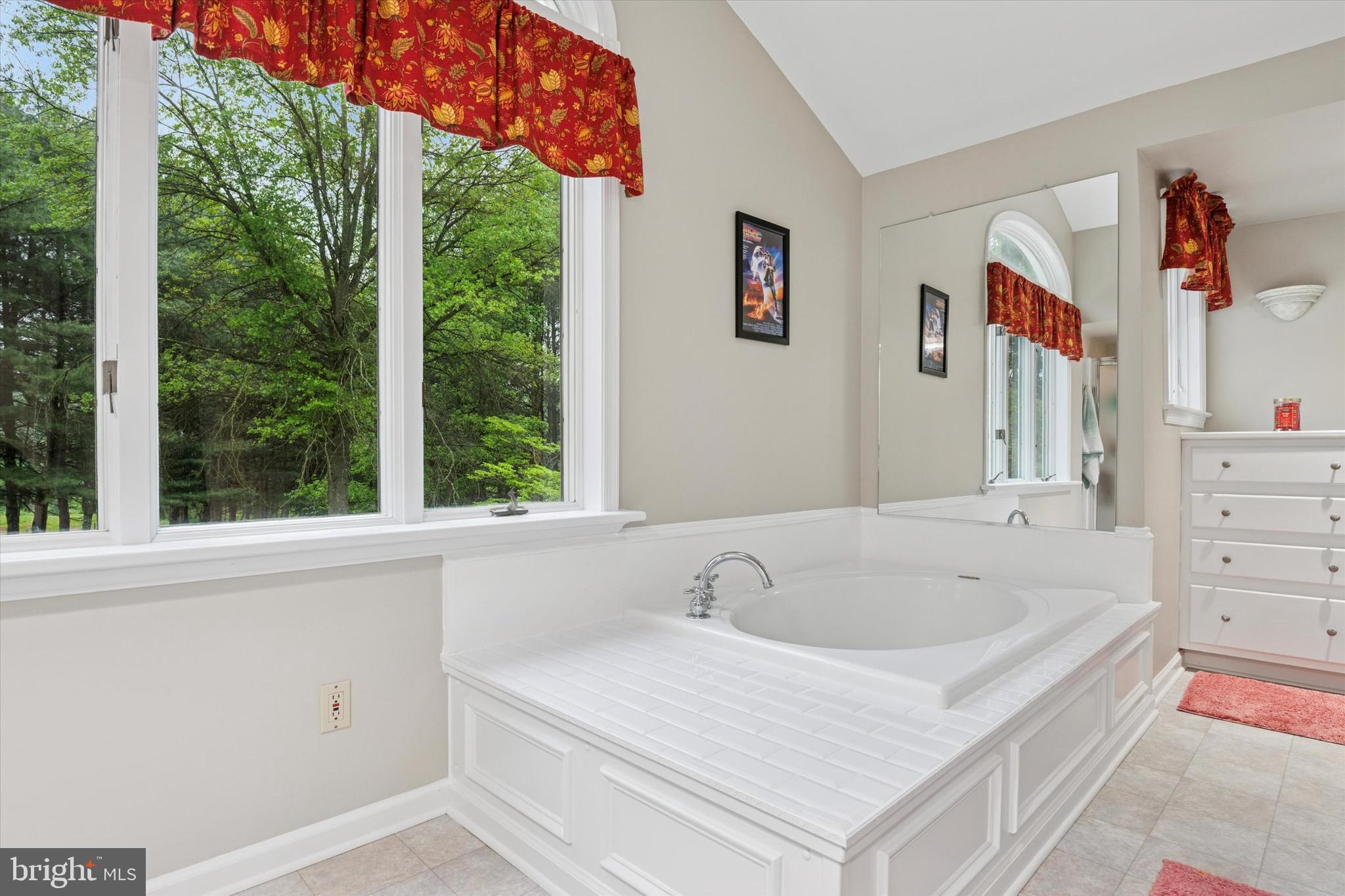 227 Parsons Road Landenberg, PA 19350 - Photo 20 of 40 a bathroom with a tub a sink and large window