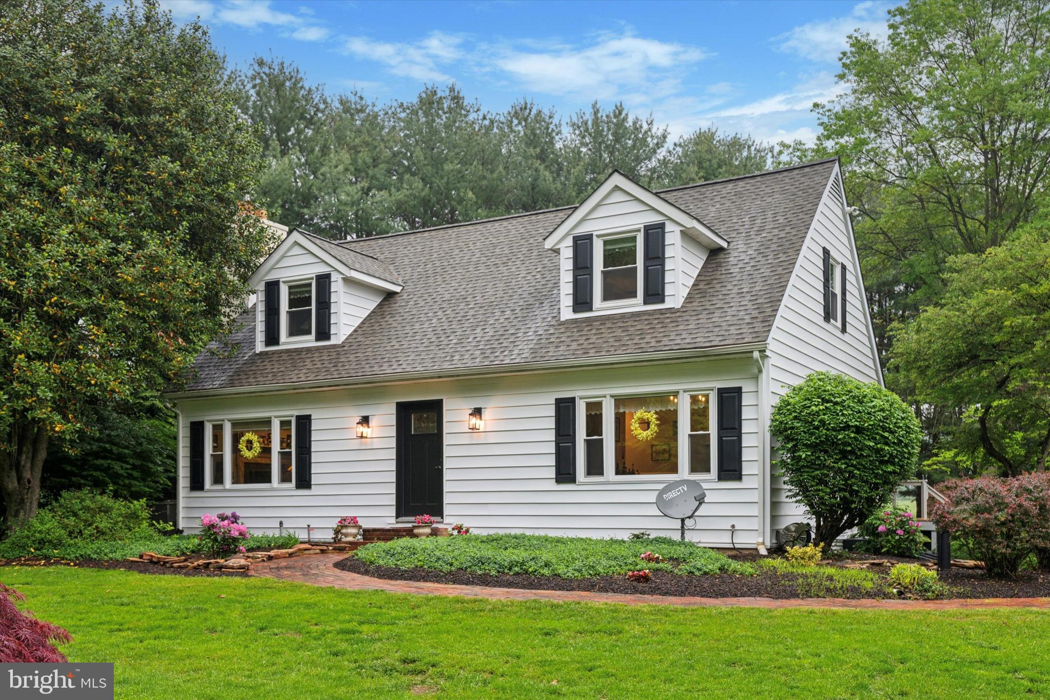 227 Parsons Road Landenberg, PA 19350 - Photo 2 of 40 a front view of house with yard and green space