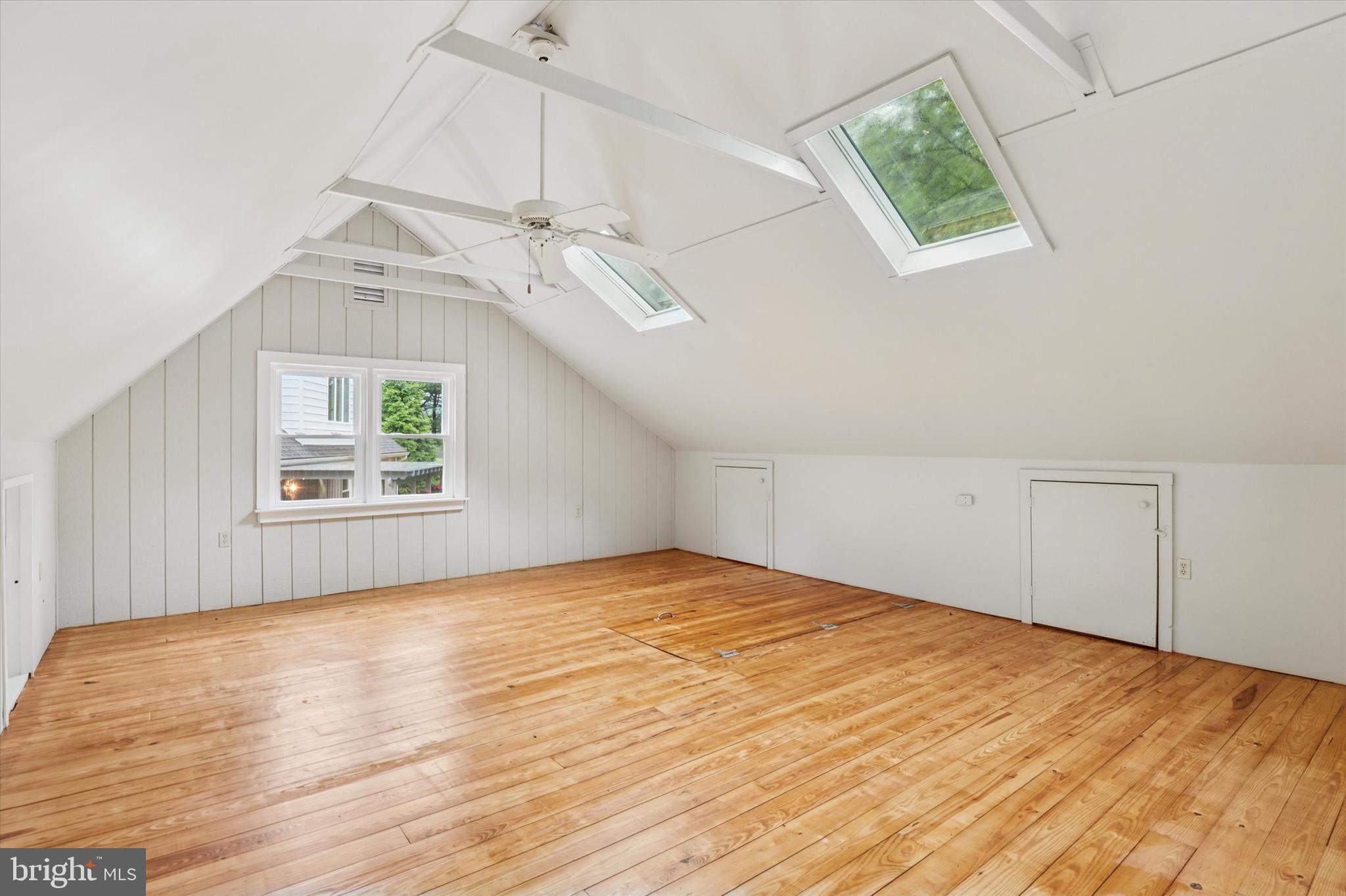 227 Parsons Road Landenberg, PA 19350 - Photo 26 of 40 a view of an empty room with window and wooden floor