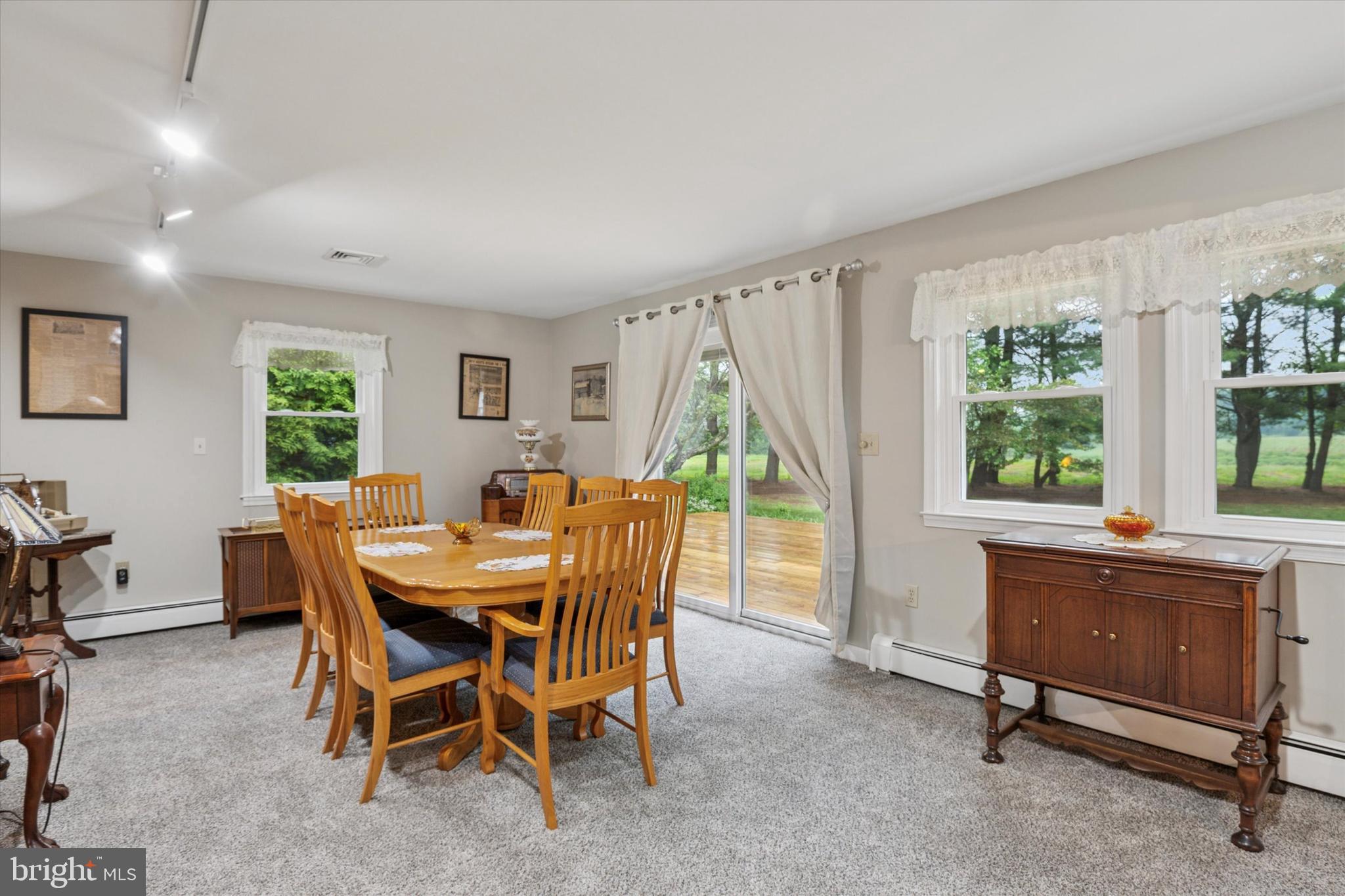 227 Parsons Road Landenberg, PA 19350 - Photo 8 of 40 a view of a dining room with furniture and a window
