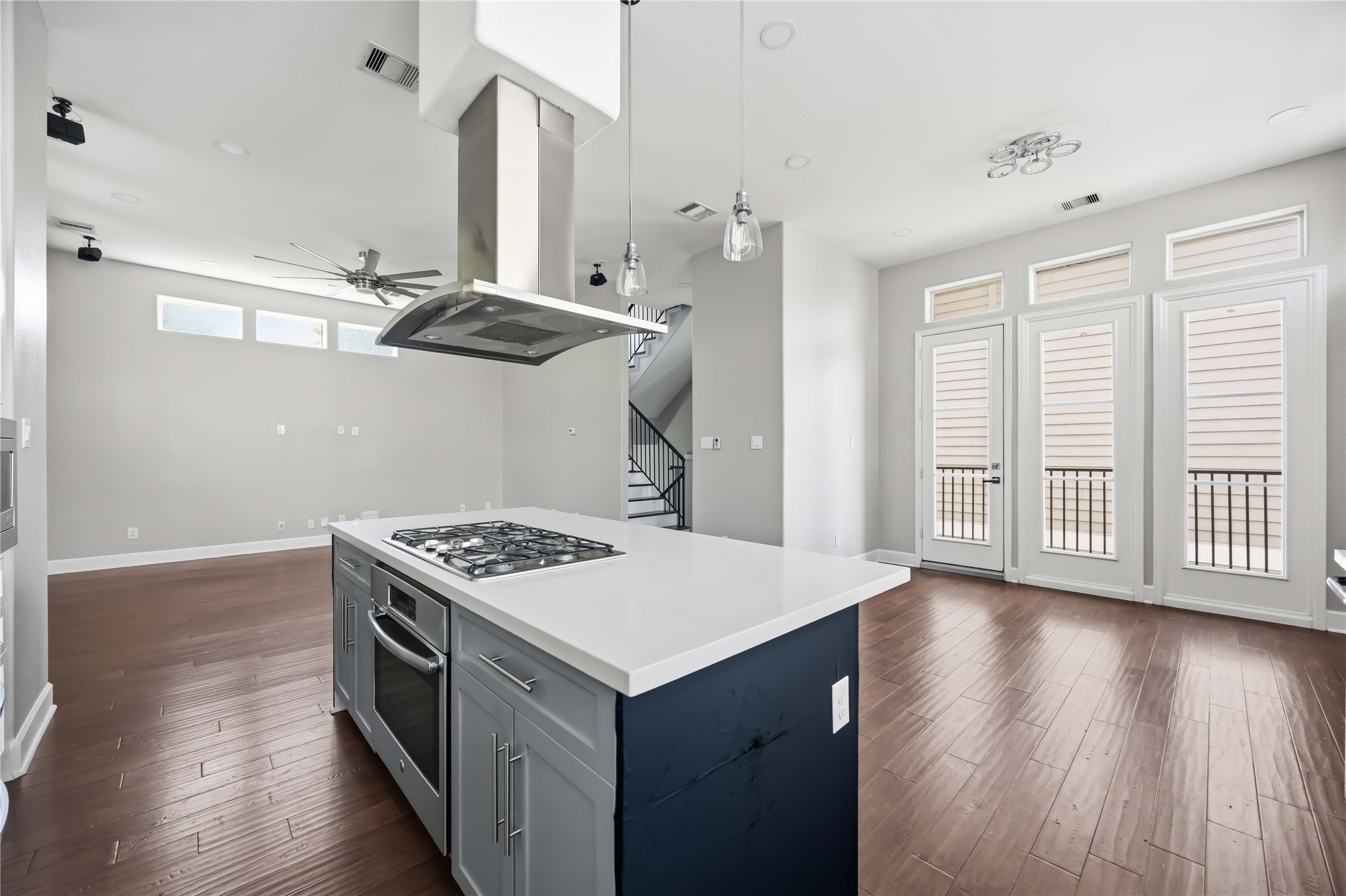 708 Schwartz Street Houston, TX 77020 - Photo 11 of 25 a kitchen that has a stove and wooden floor