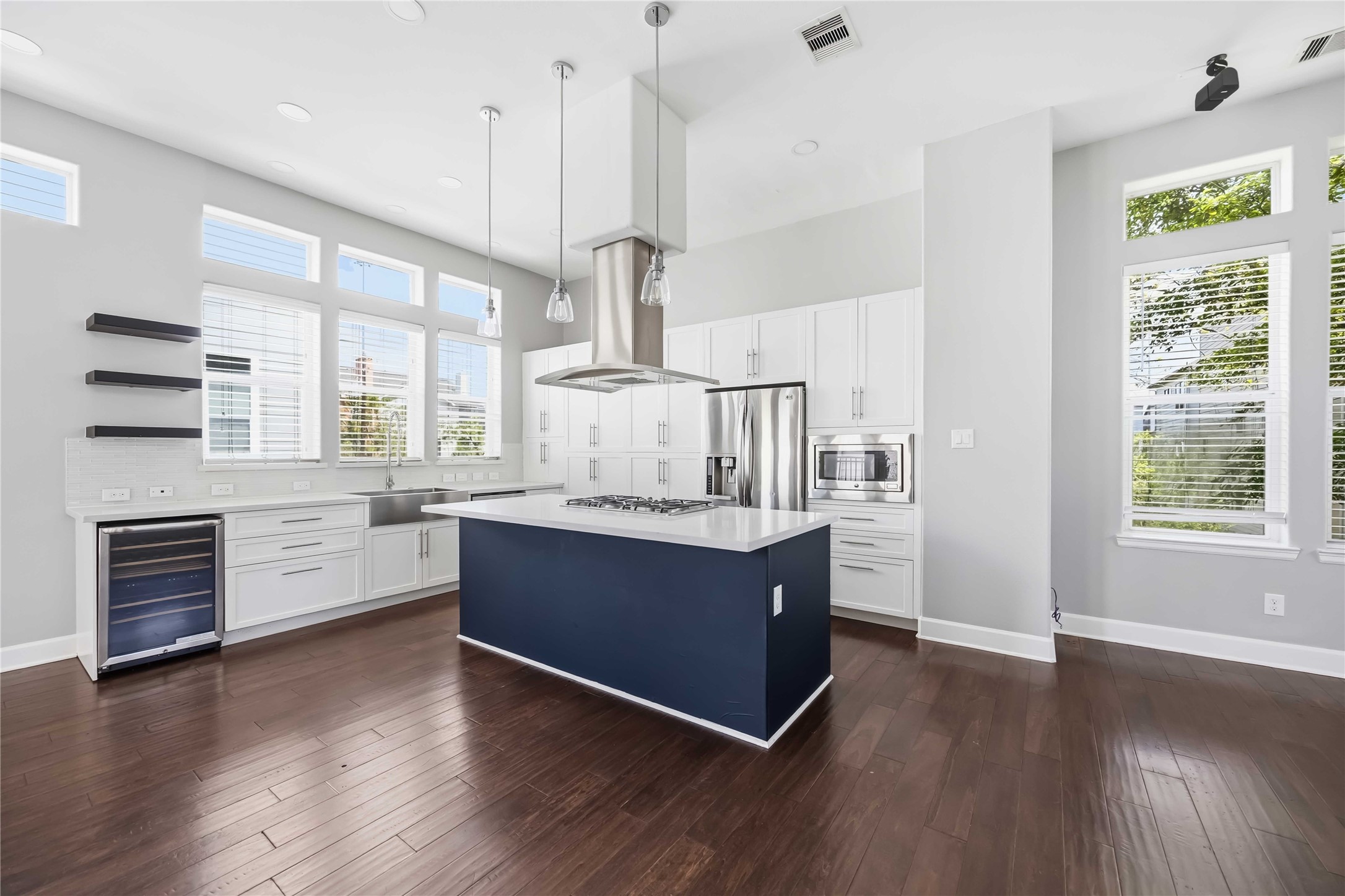 708 Schwartz Street Houston, TX 77020 - Photo 12 of 25 a room with wooden floors and window