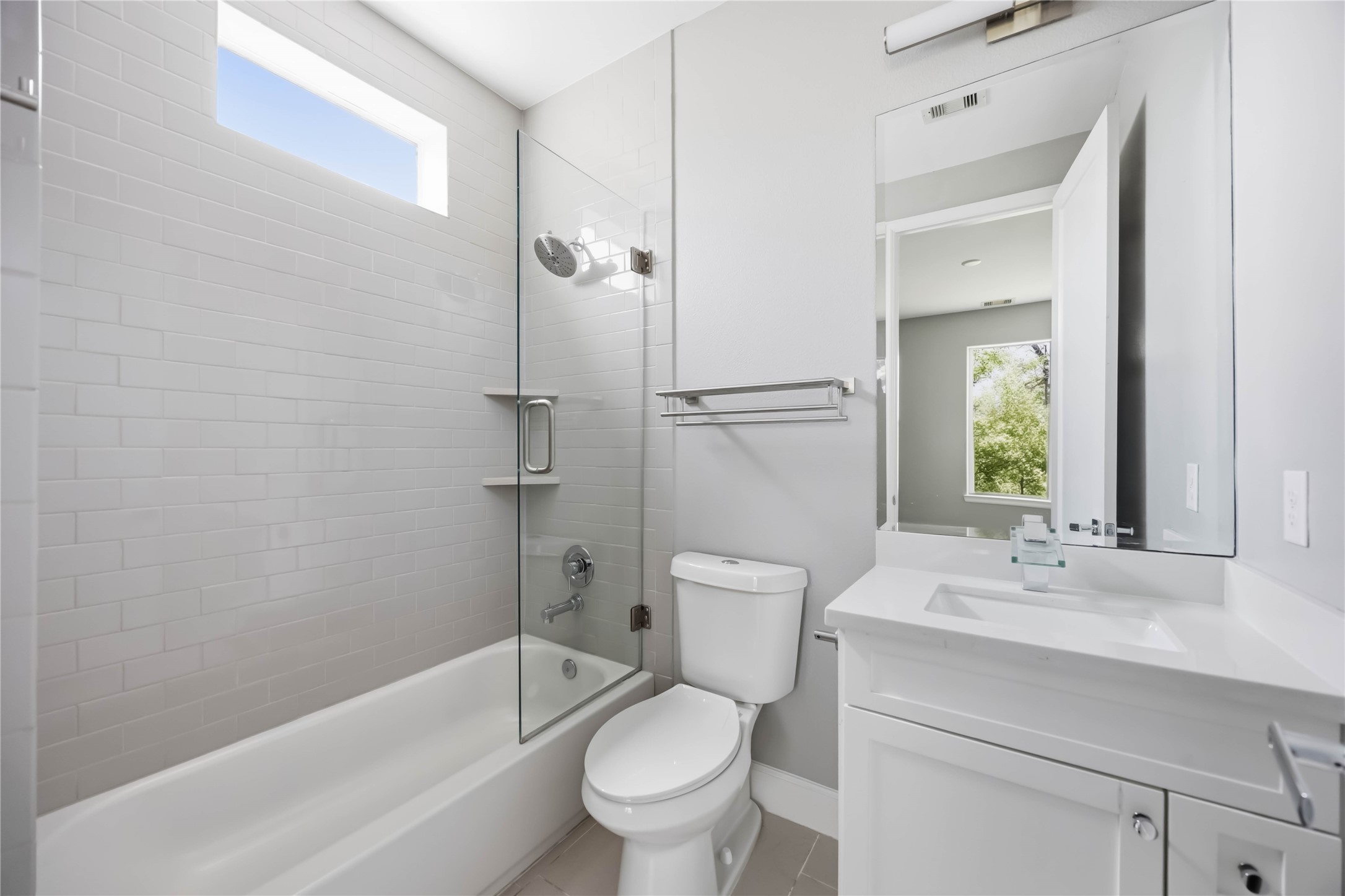 708 Schwartz Street Houston, TX 77020 - Photo 15 of 25 a bathroom with a sink toilet and shower