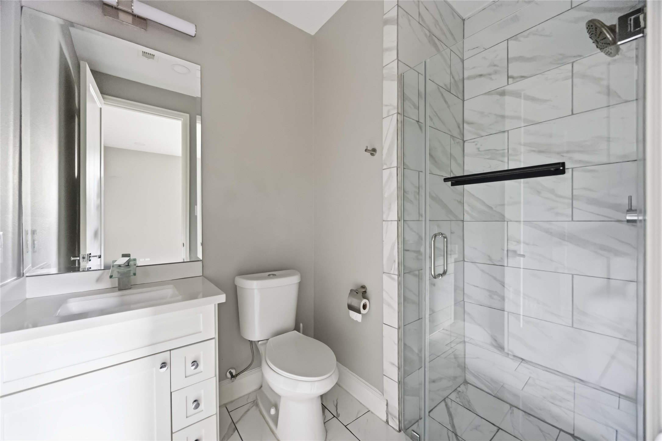 708 Schwartz Street Houston, TX 77020 - Photo 20 of 25 a bathroom with a sink toilet and shower