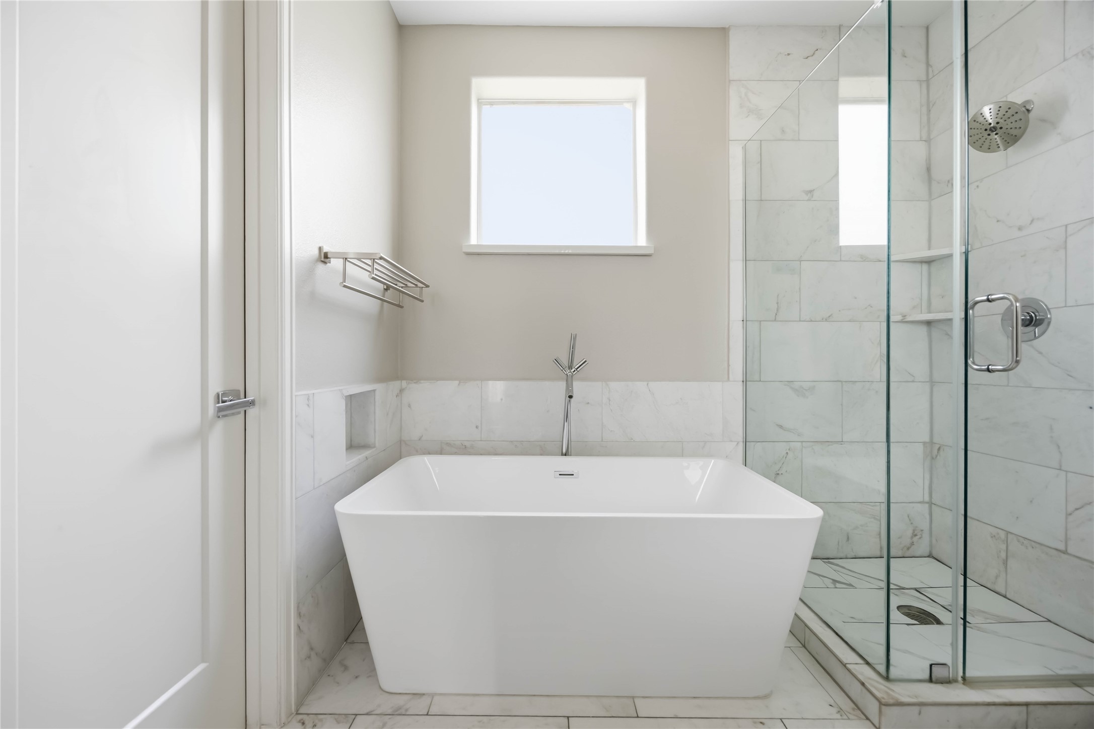 708 Schwartz Street Houston, TX 77020 - Photo 5 of 25 a white bath tub sitting next to a shower