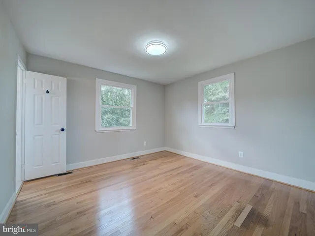 a bathroom with a toilet a sink and shower