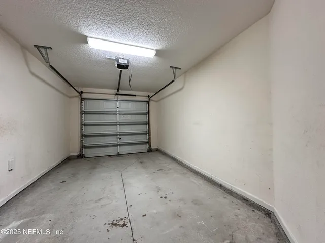 a view of room with stairs and a window