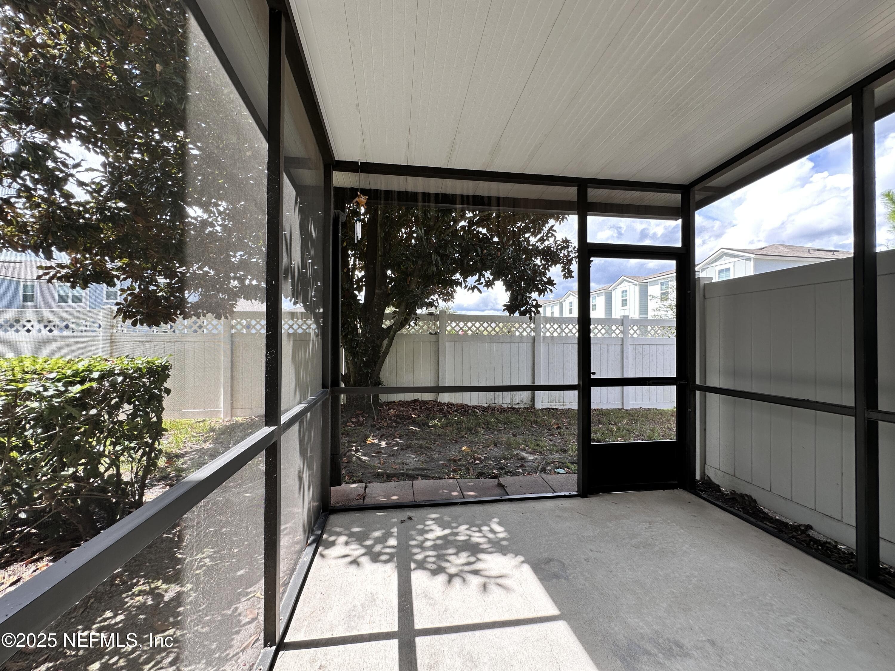 3730 Creswick Circle, Unit 5 Orange Park, FL 32065 - Photo 18 of 18 a view of a outdoor space with a large window