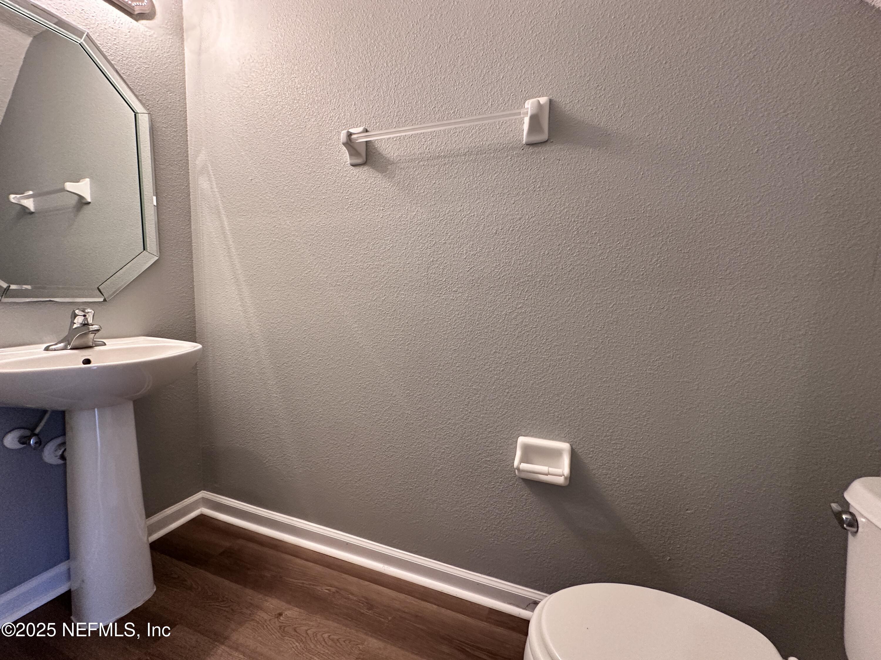 3730 Creswick Circle, Unit 5 Orange Park, FL 32065 - Photo 7 of 18 a bathroom with a sink mirror and toilet