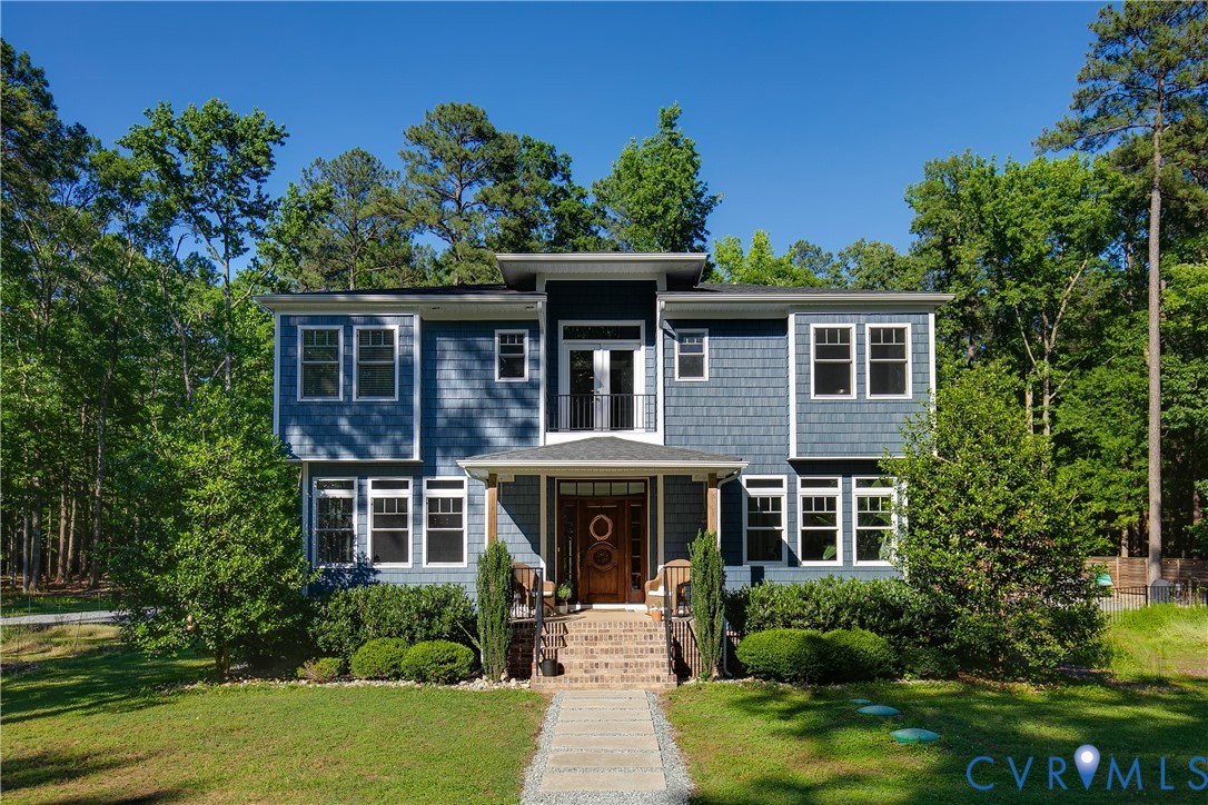 9749 Hoke Brady Road Henrico, VA 23231 - Photo 1 of 53 a front view of a house with a yard