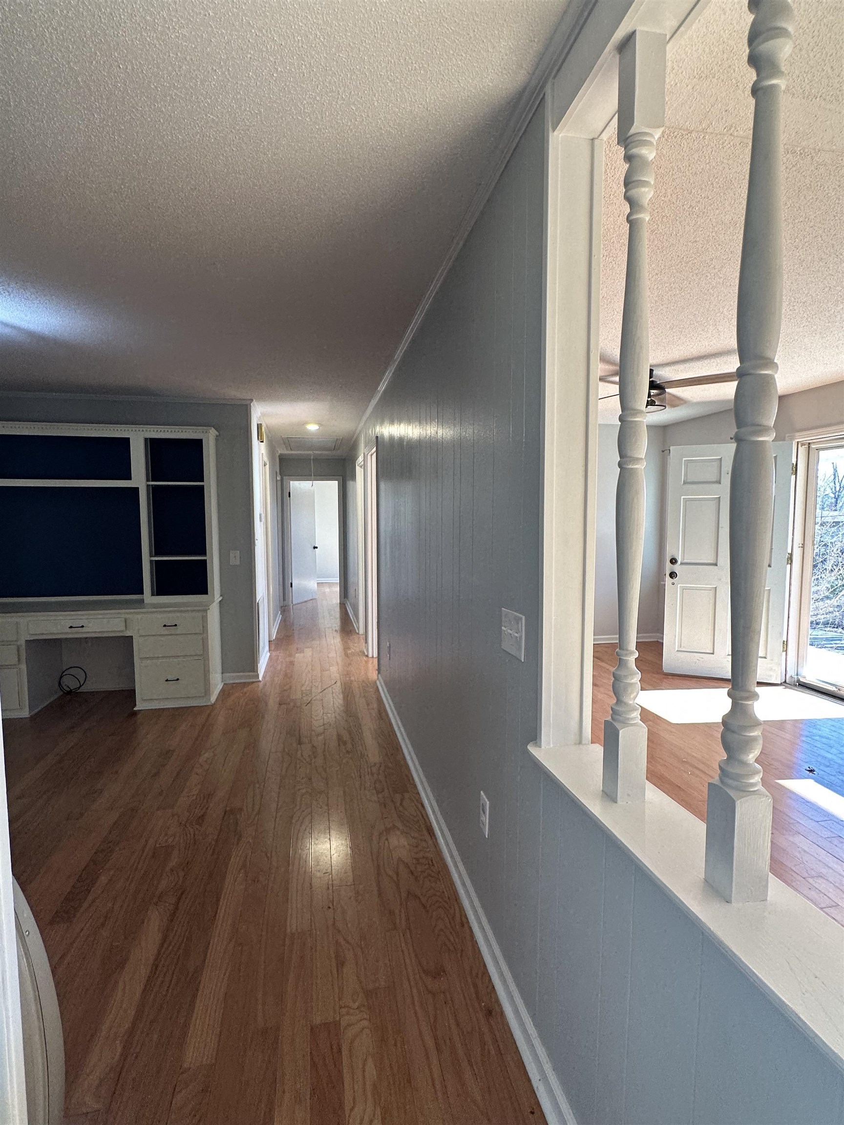 141 Pecan Street Selmer, TN 38375 - Photo 21 of 35 a view of gallery with wooden floor