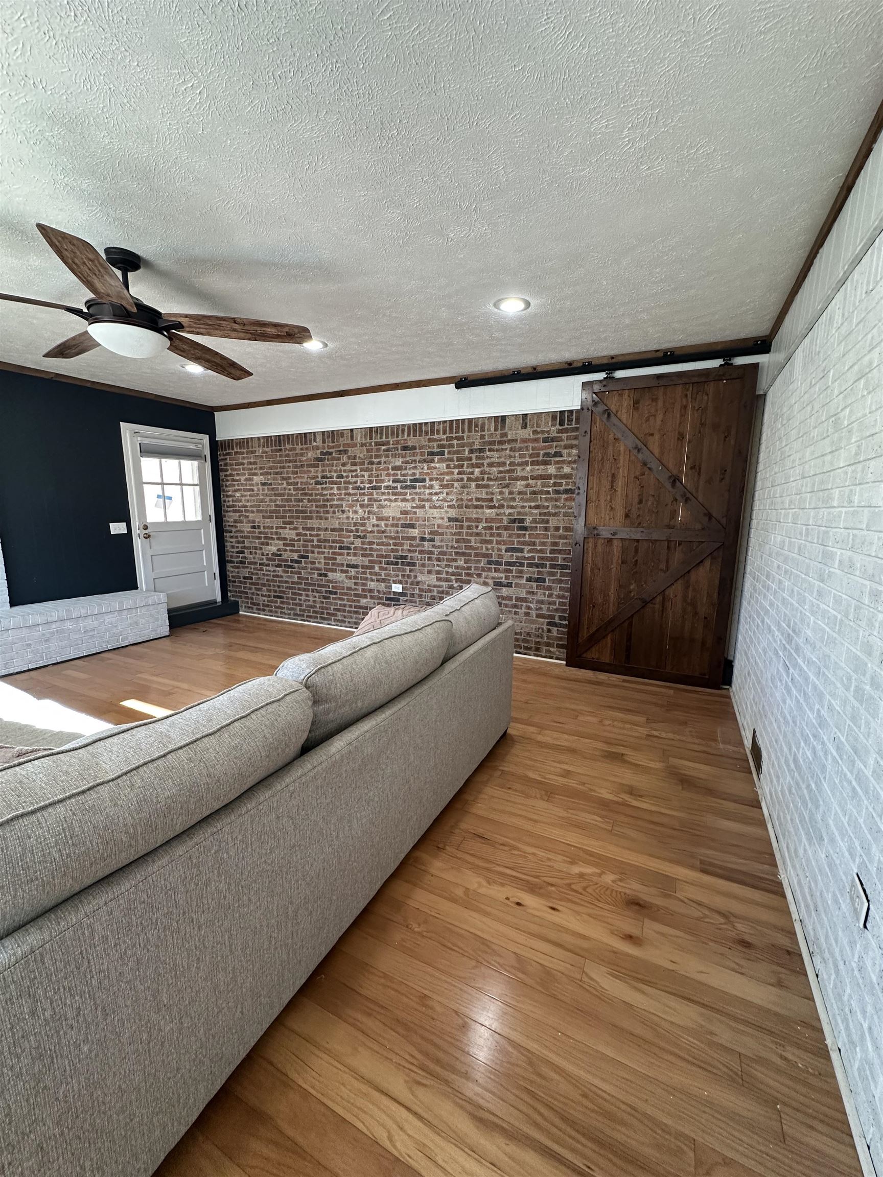 141 Pecan Street Selmer, TN 38375 - Photo 3 of 35 a living room with a couch