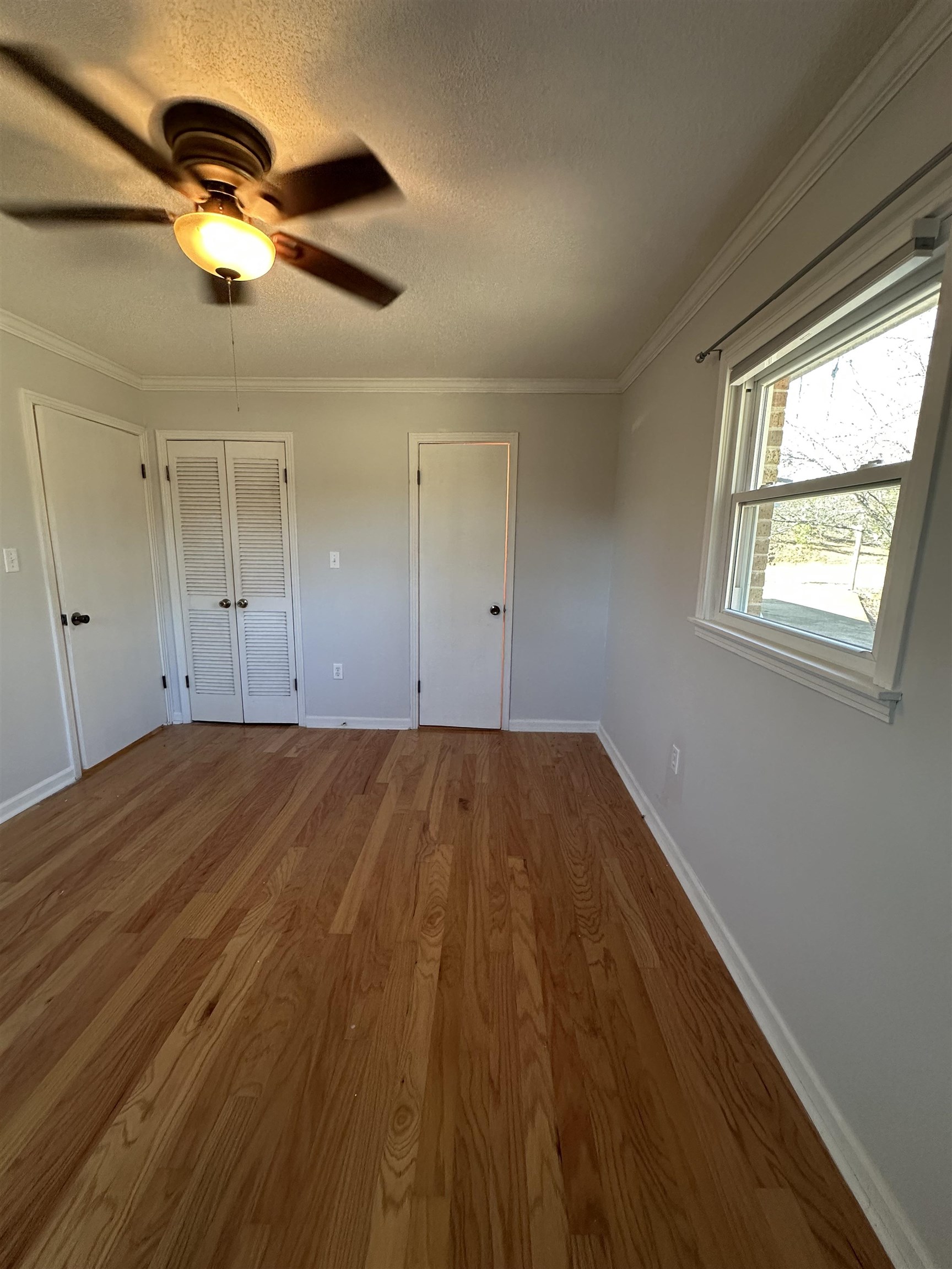 141 Pecan Street Selmer, TN 38375 - Photo 31 of 35 a view of empty room with wooden floor