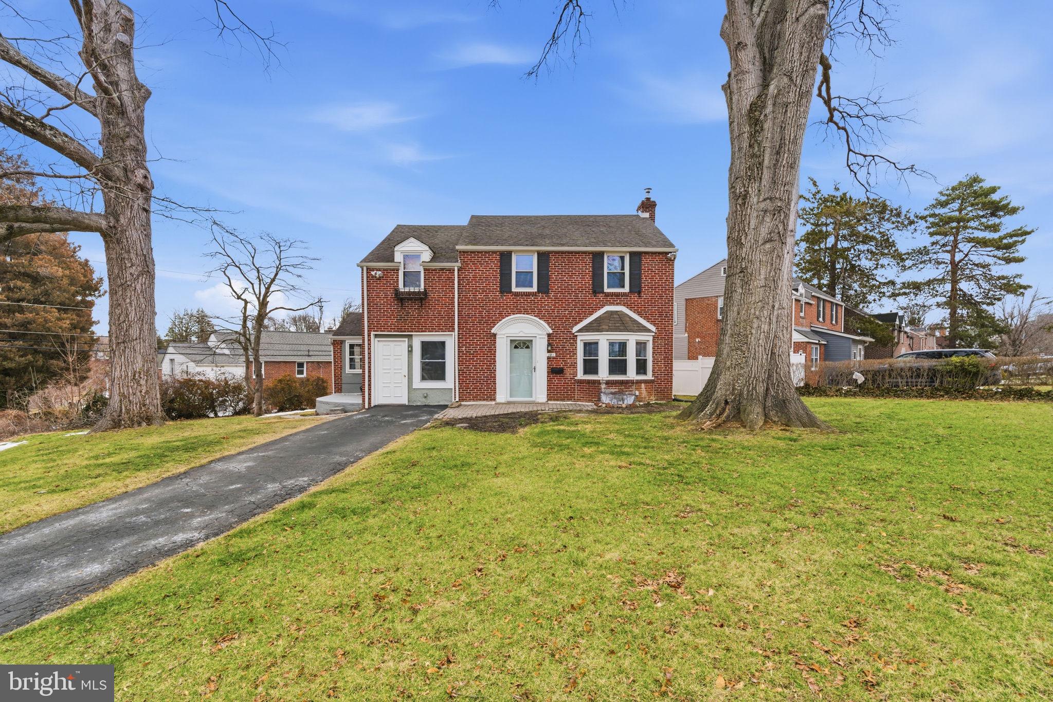 a front view of house with yard