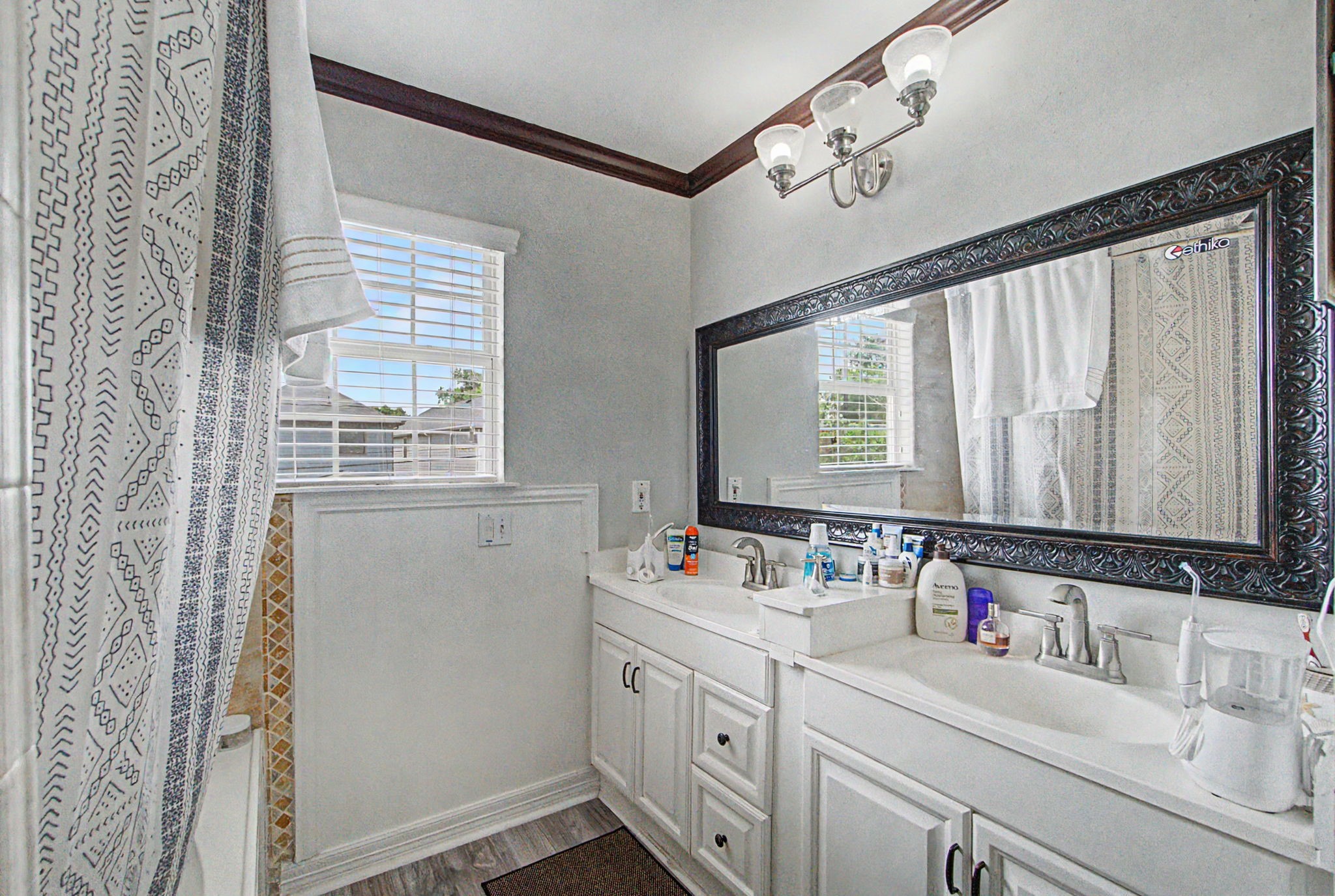 10034 Alfred Lane Houston, TX 77041 - Photo 40 of 50 Clean lines, timeless finishes, and everyday convenience come together in this well-appointed bathroom.