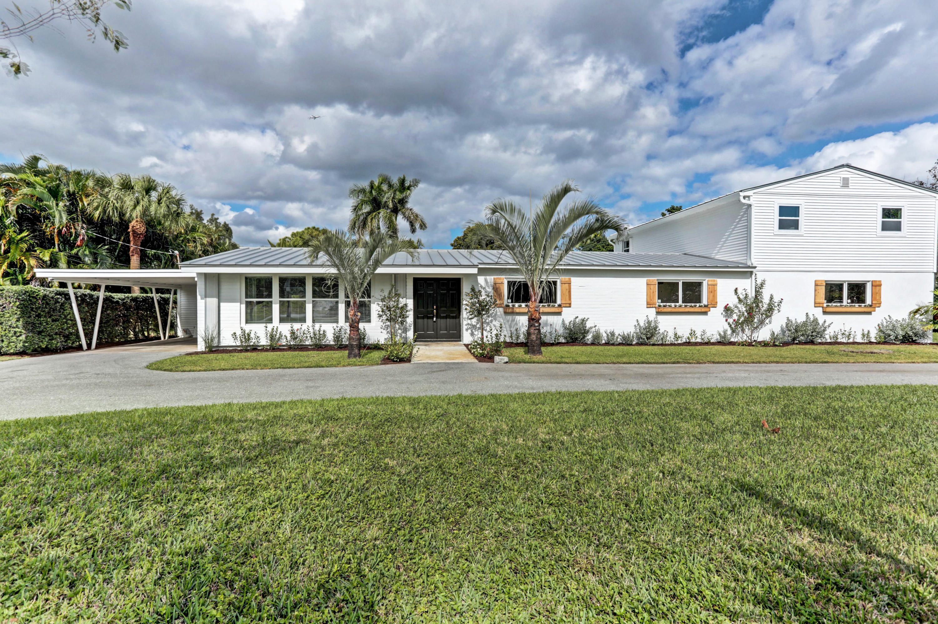1375 Churchill Road Glen Ridge, FL 33406 - Photo 1 of 74 06_320a8378_79_80_81_82