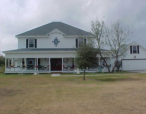 a front view of a building with swimming pool