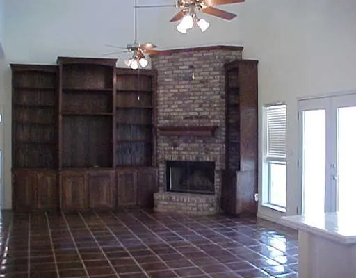 a living room with a fireplace