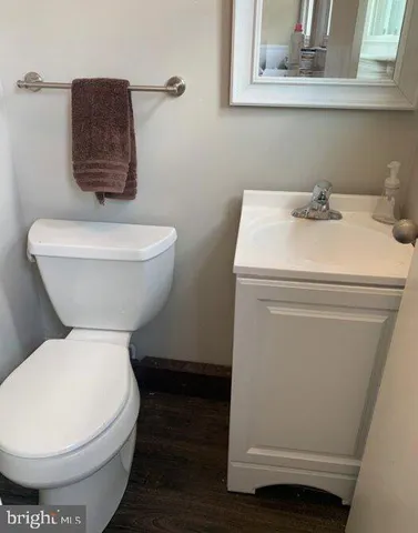 a bathroom with a toilet and a sink