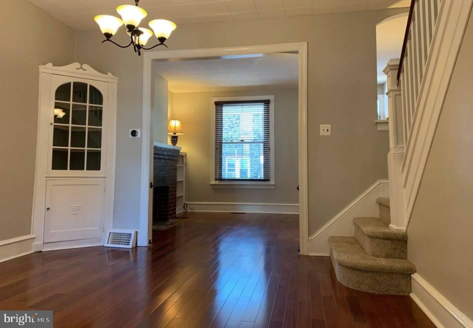272 Kalos Street Philadelphia, PA 19128 - Photo 5 of 21 a view of an entryway with wooden floor and a window