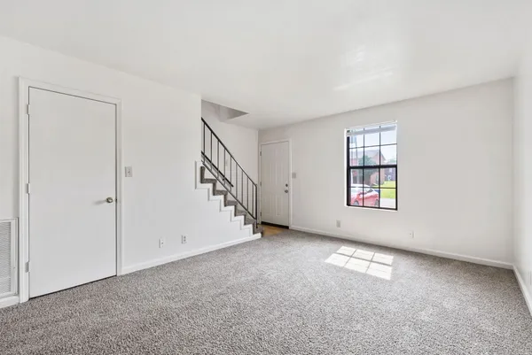 an empty room with windows