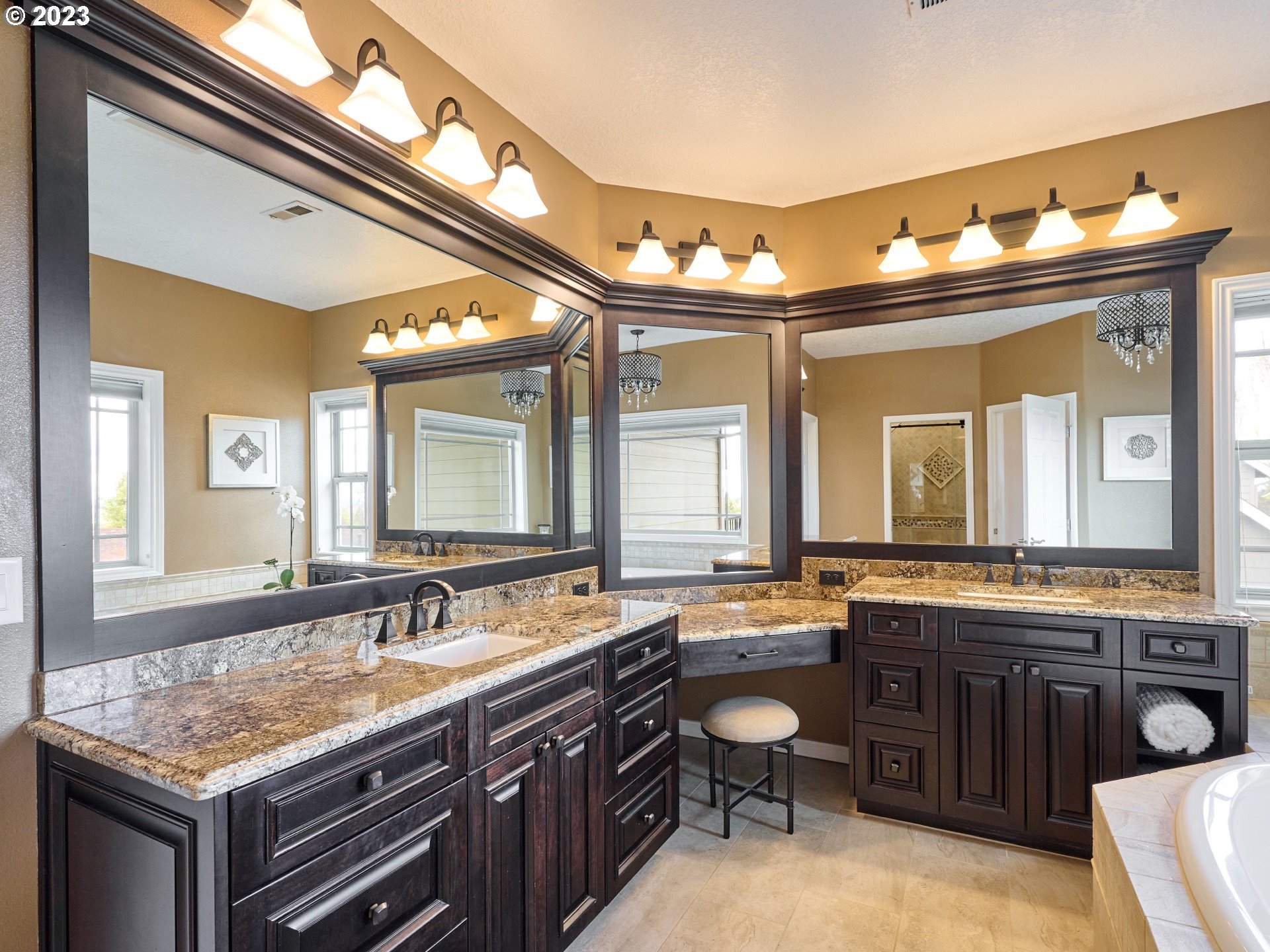 104 Breyonna Way Silverton, OR 97381 - Photo 22 of 45 a bathroom with a granite countertop sink and a large mirror
