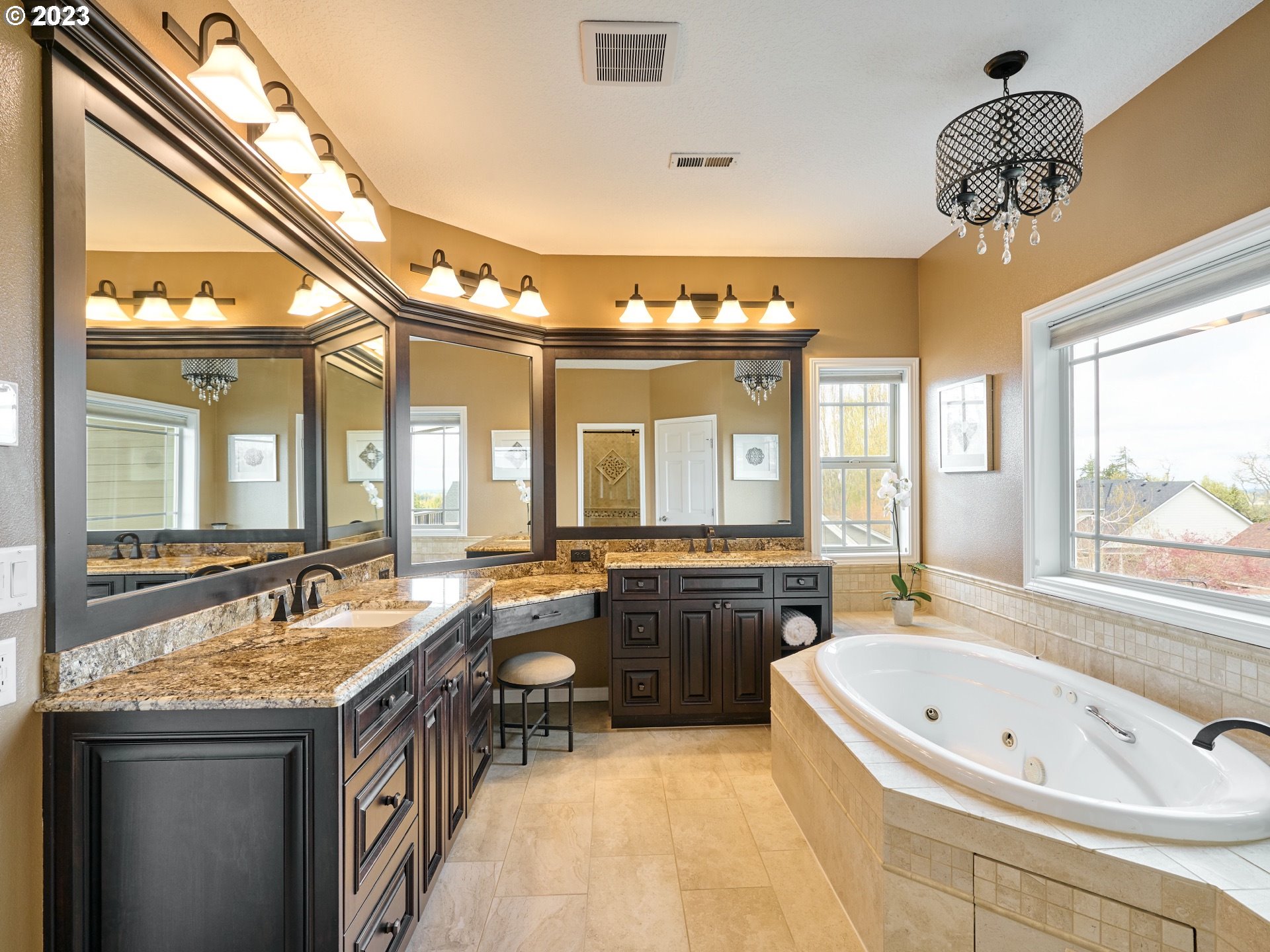 104 Breyonna Way Silverton, OR 97381 - Photo 23 of 45 a spacious bathroom with a granite countertop tub sink and mirror