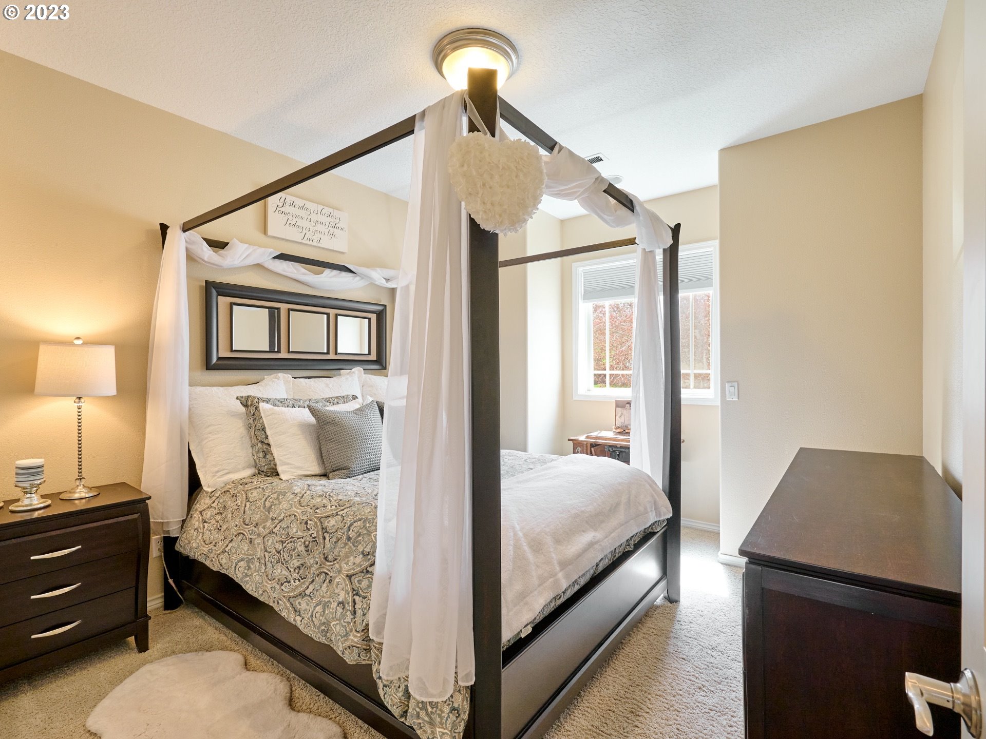 104 Breyonna Way Silverton, OR 97381 - Photo 25 of 45 a bedroom with a bed and a night stand