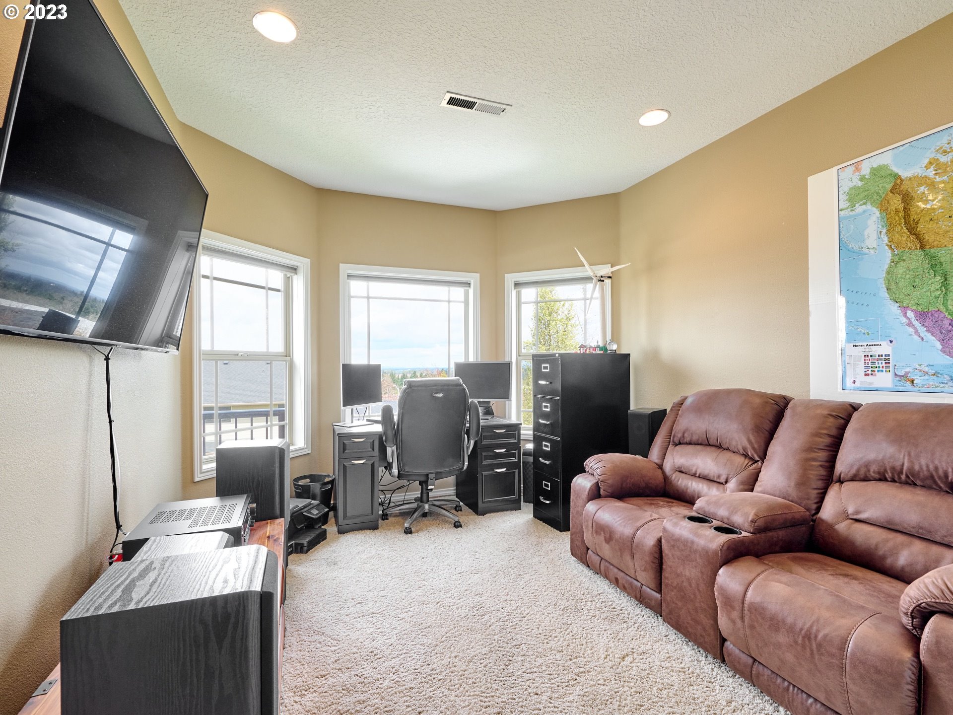 104 Breyonna Way Silverton, OR 97381 - Photo 27 of 45 a living room with furniture ceiling fan and a window