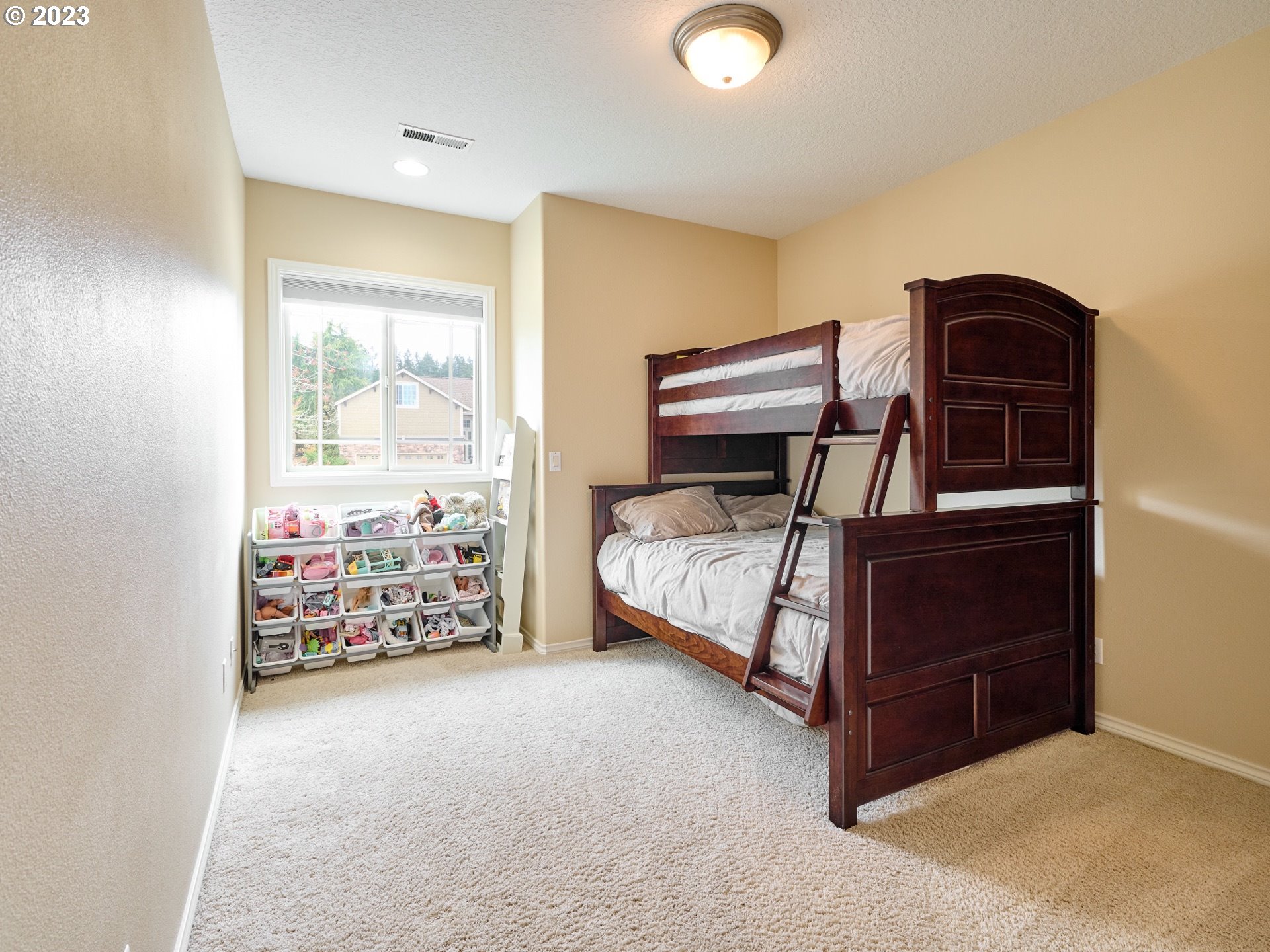 104 Breyonna Way Silverton, OR 97381 - Photo 28 of 45 a bedroom with a bed and a window