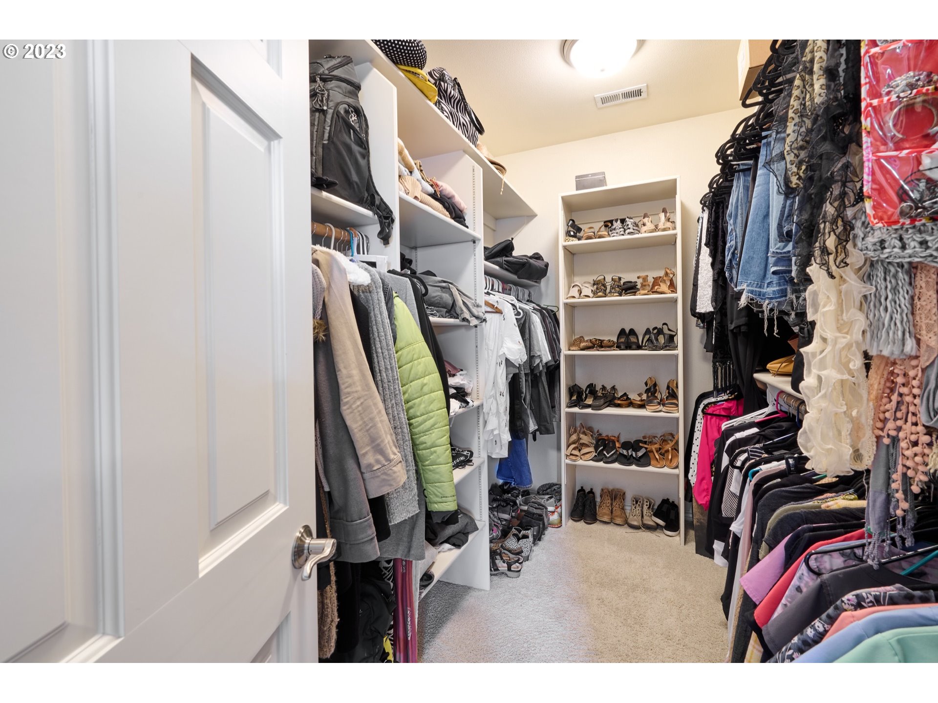 104 Breyonna Way Silverton, OR 97381 - Photo 29 of 45 a view of walk in closet with clothes and shoes
