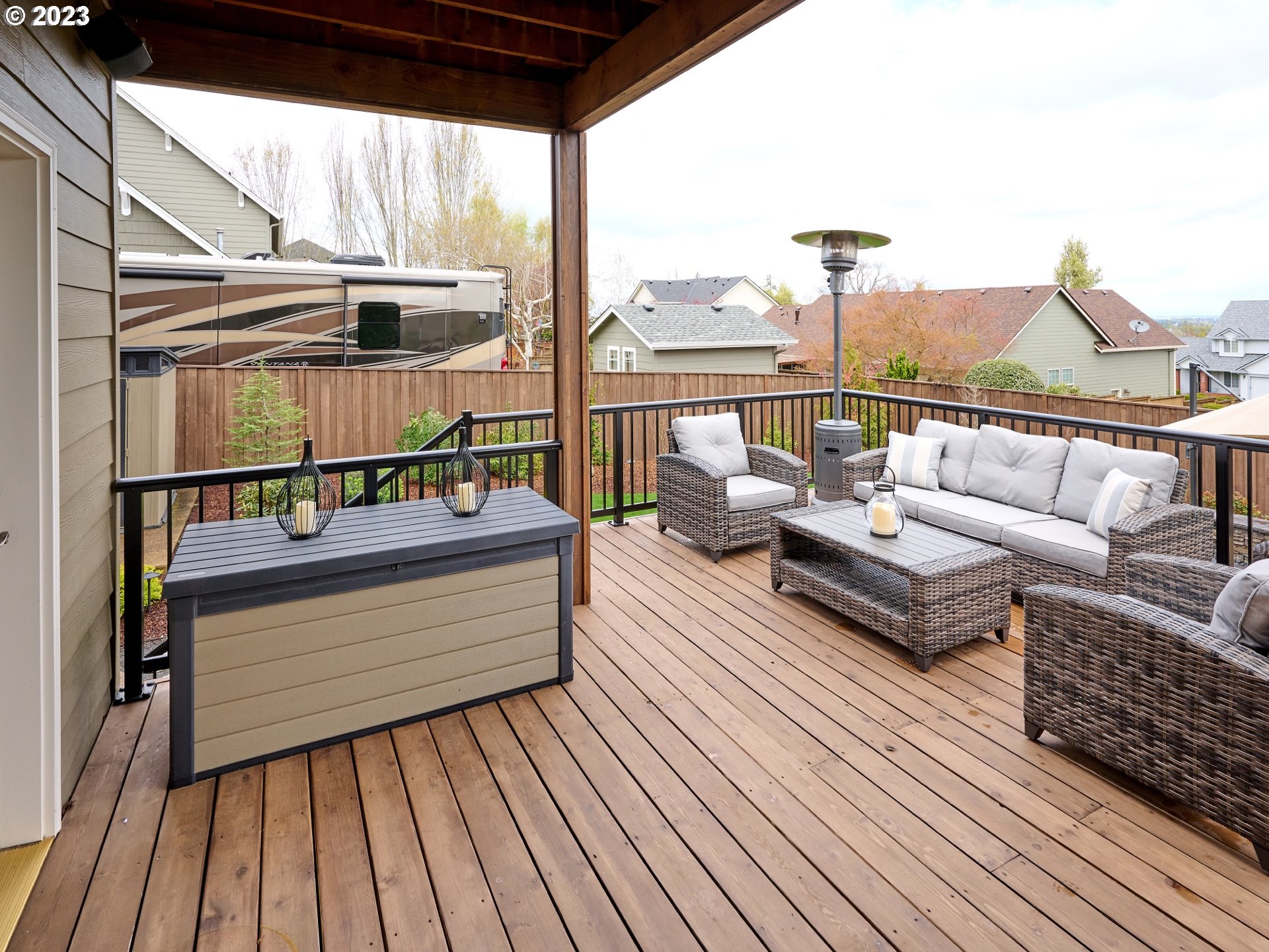 104 Breyonna Way Silverton, OR 97381 - Photo 42 of 45 a patio with patio couch and wooden floor