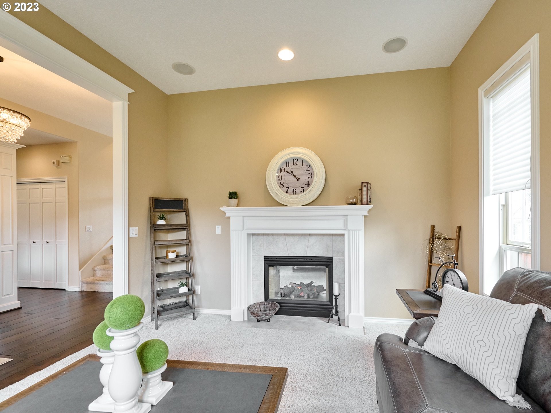 104 Breyonna Way Silverton, OR 97381 - Photo 7 of 45 a living room with furniture and a fireplace