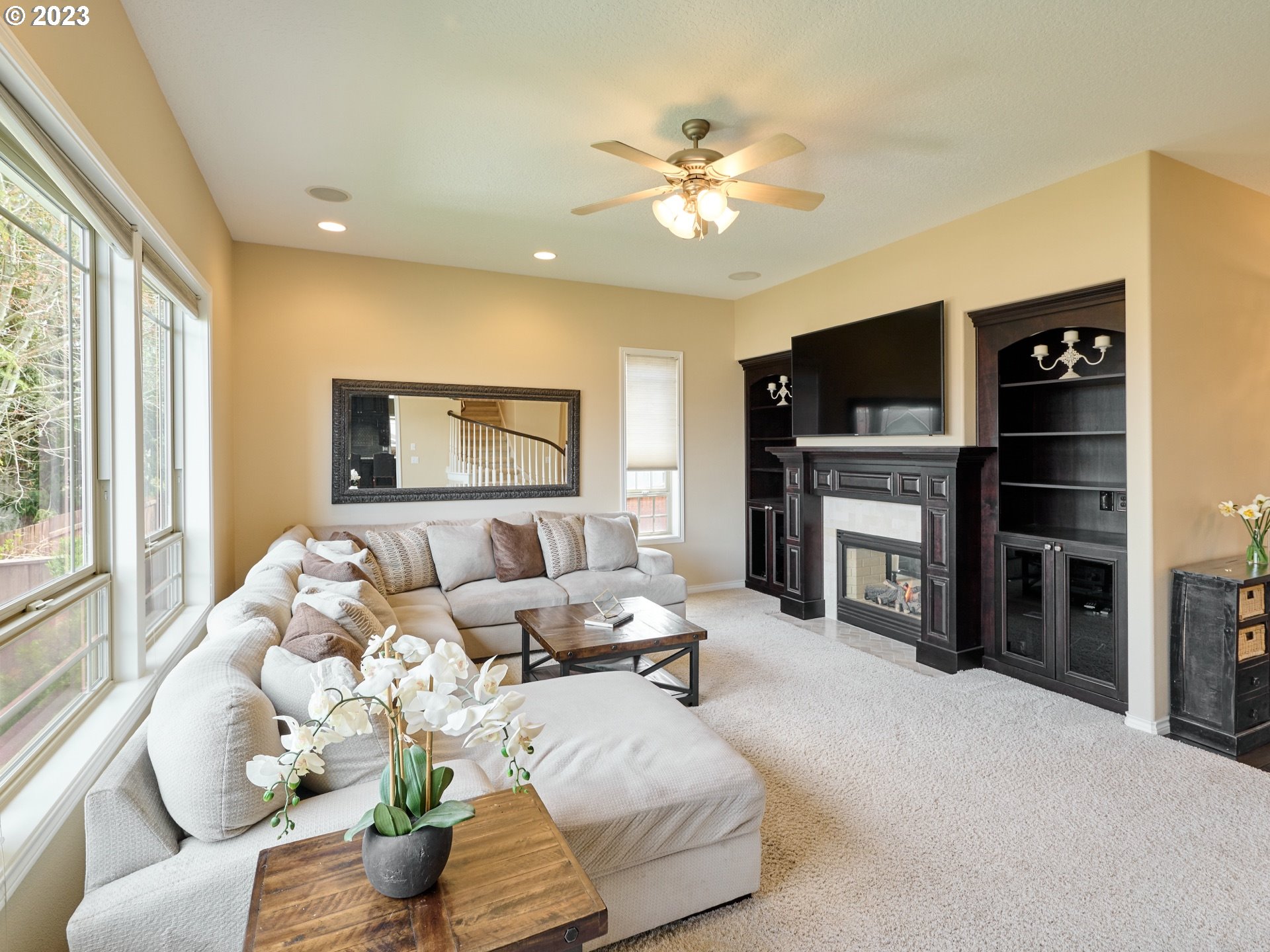 104 Breyonna Way Silverton, OR 97381 - Photo 9 of 45 a living room with furniture and a flat screen tv