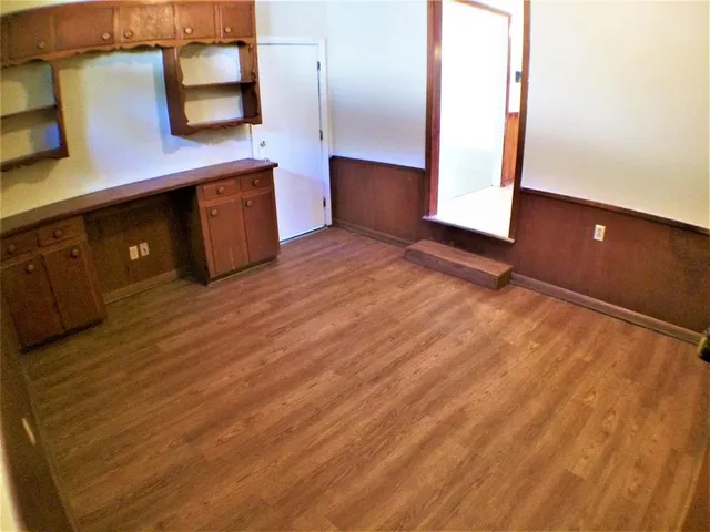 a view of a kitchen with a sink