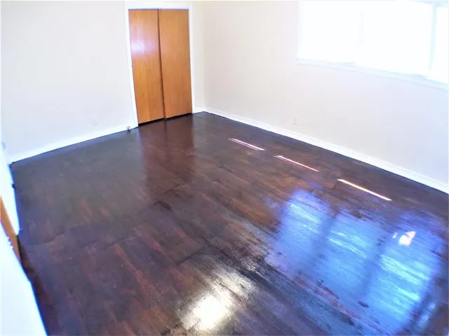 a view of an empty room and window