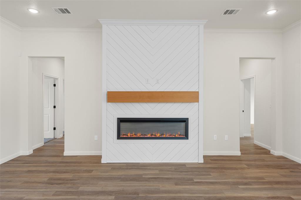 920 Gallant Fox Hewitt, TX 76643 - Photo 7 of 36 a living room with furniture and a fireplace