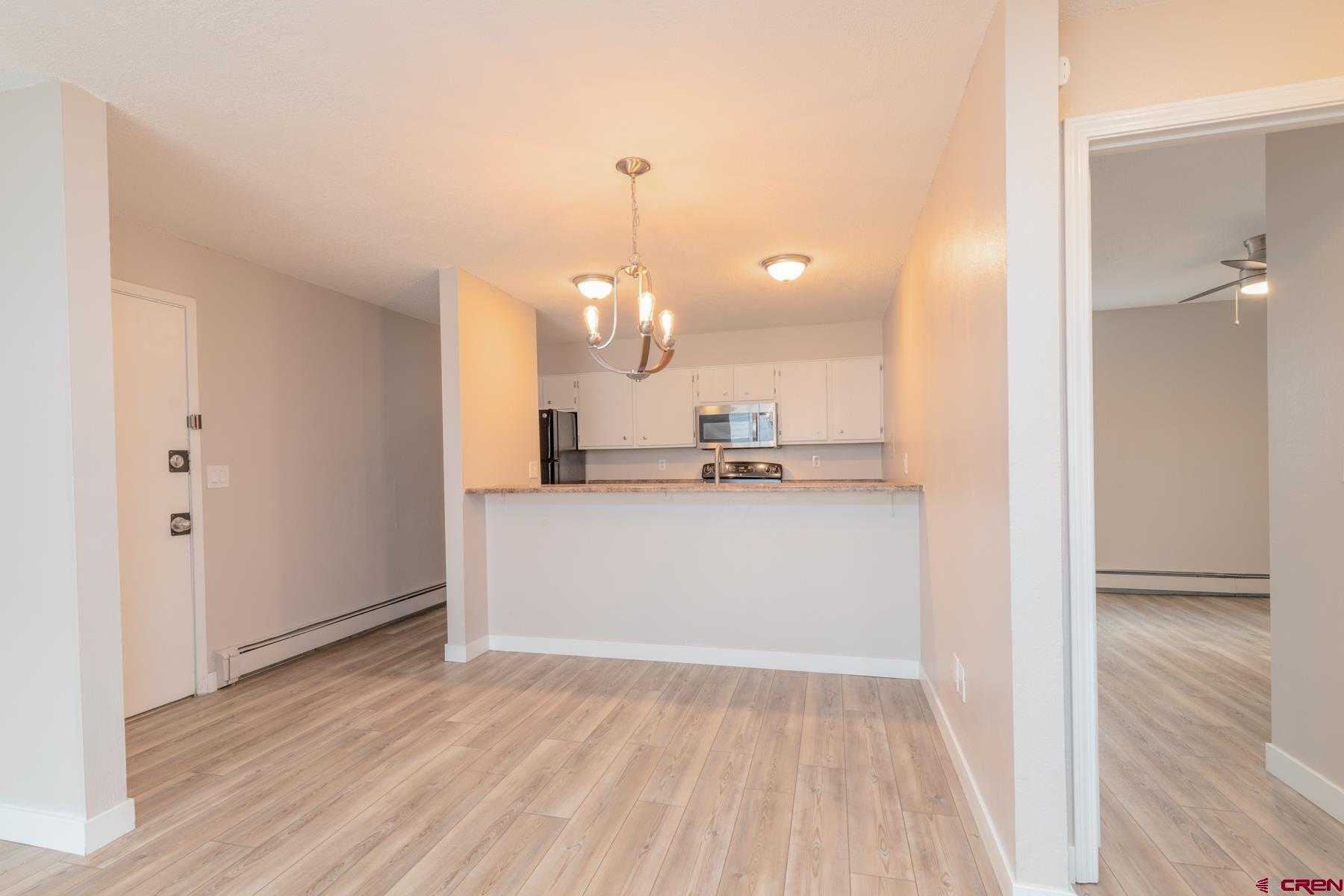 1135 Florida Road, Unit B2 Durango, CO 81301 - Photo 2 of 26 a view of a kitchen from the hallway