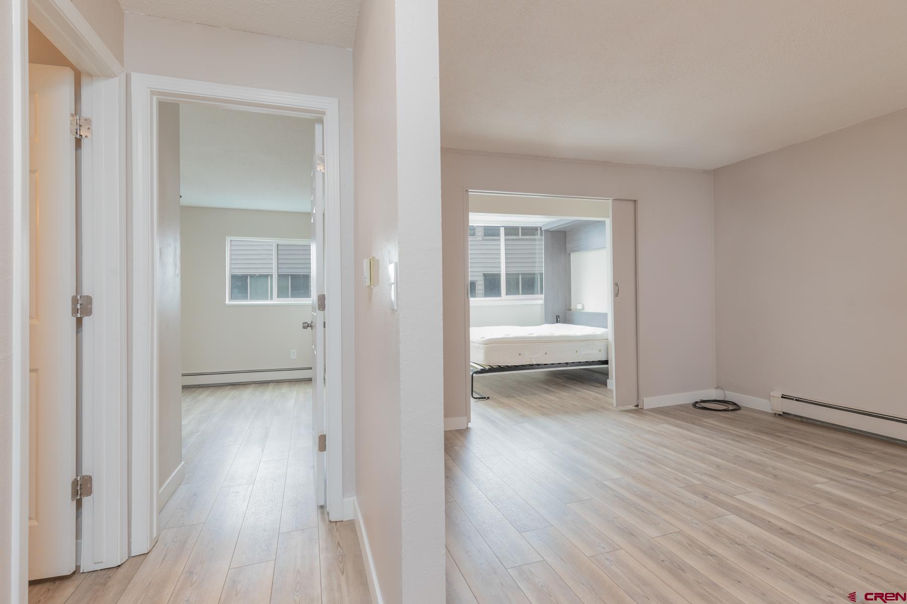 1135 Florida Road, Unit B2 Durango, CO 81301 - Photo 7 of 26 a view of a room with wooden floor and a bathroom