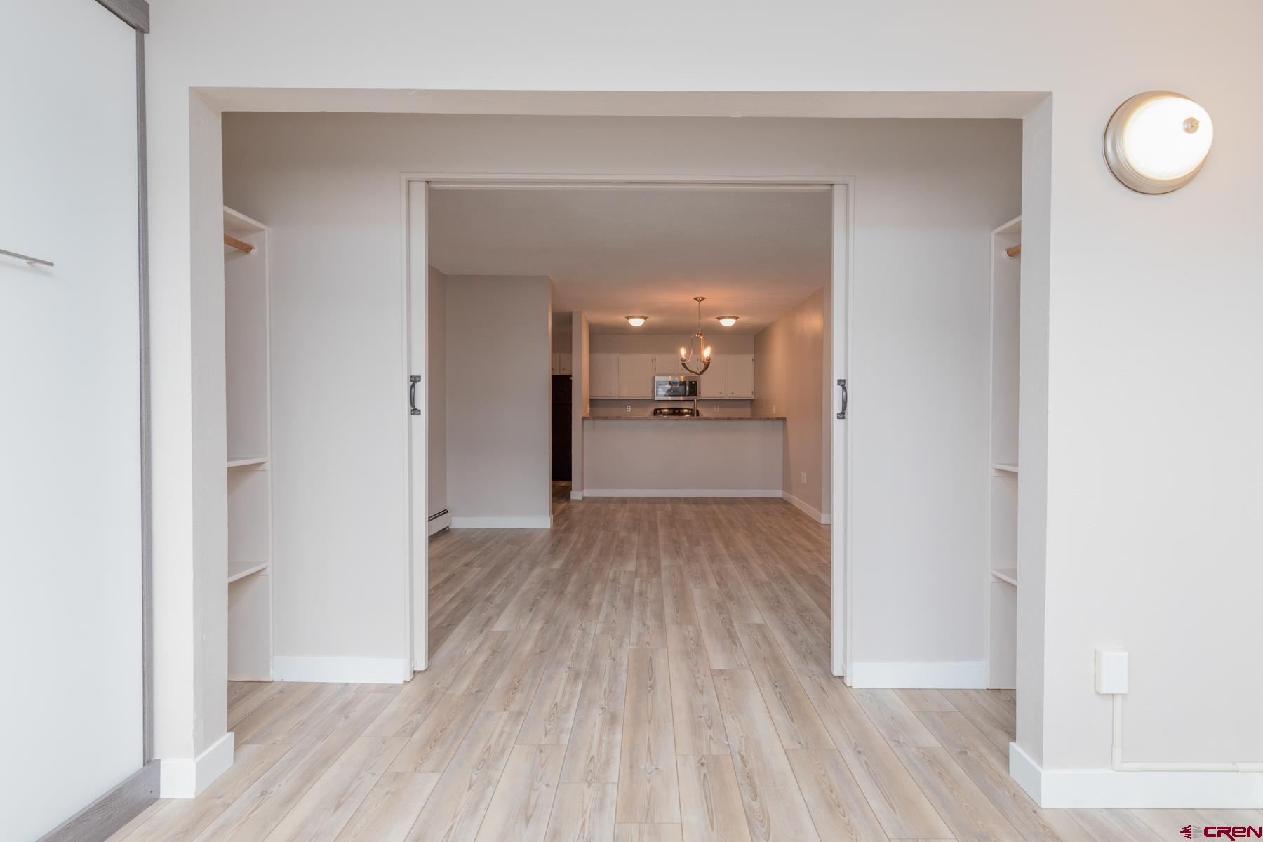 1135 Florida Road, Unit B2 Durango, CO 81301 - Photo 9 of 26 a view of a hallway and wooden floor
